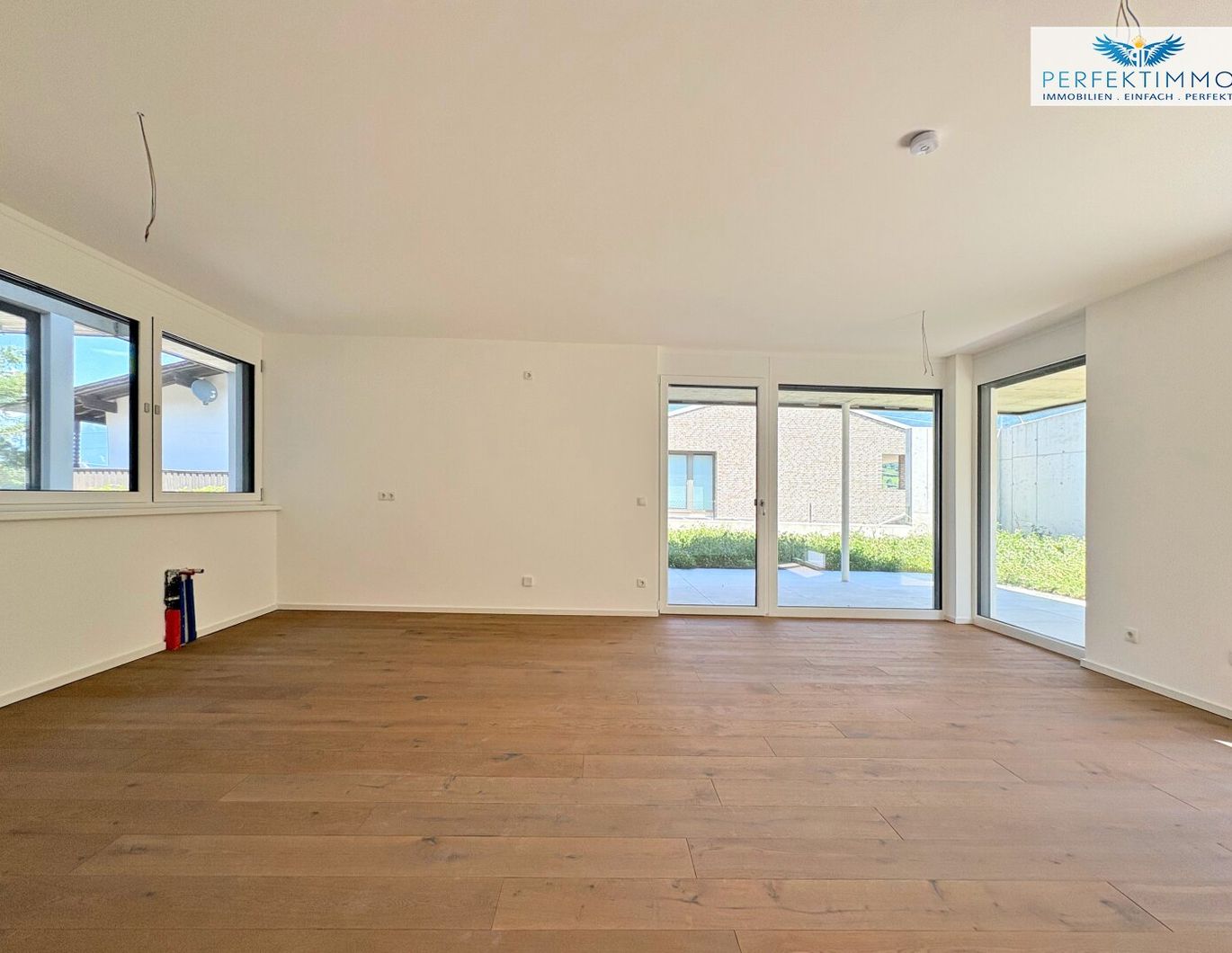 Erstklassiger Neubau: 3-Zimmer-Wohnung Top 1 mit Terrasse und Garten