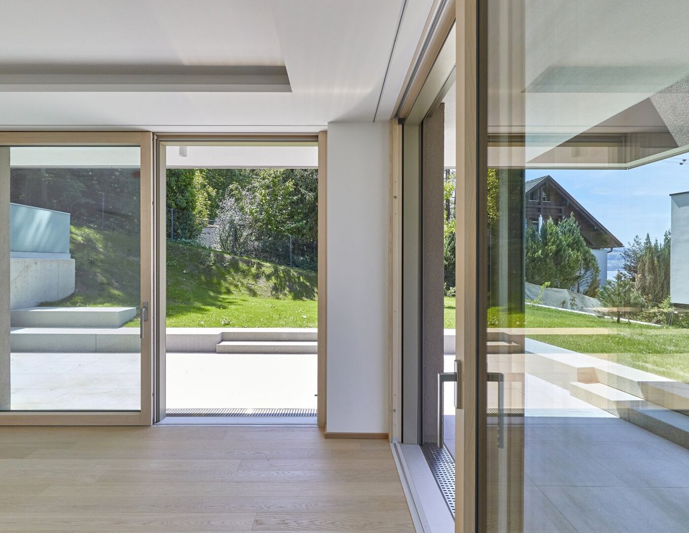 Bellevue Garten Suite - 4 Zimmer Wohnung mit 290 m² Privatgarten und Seeblick