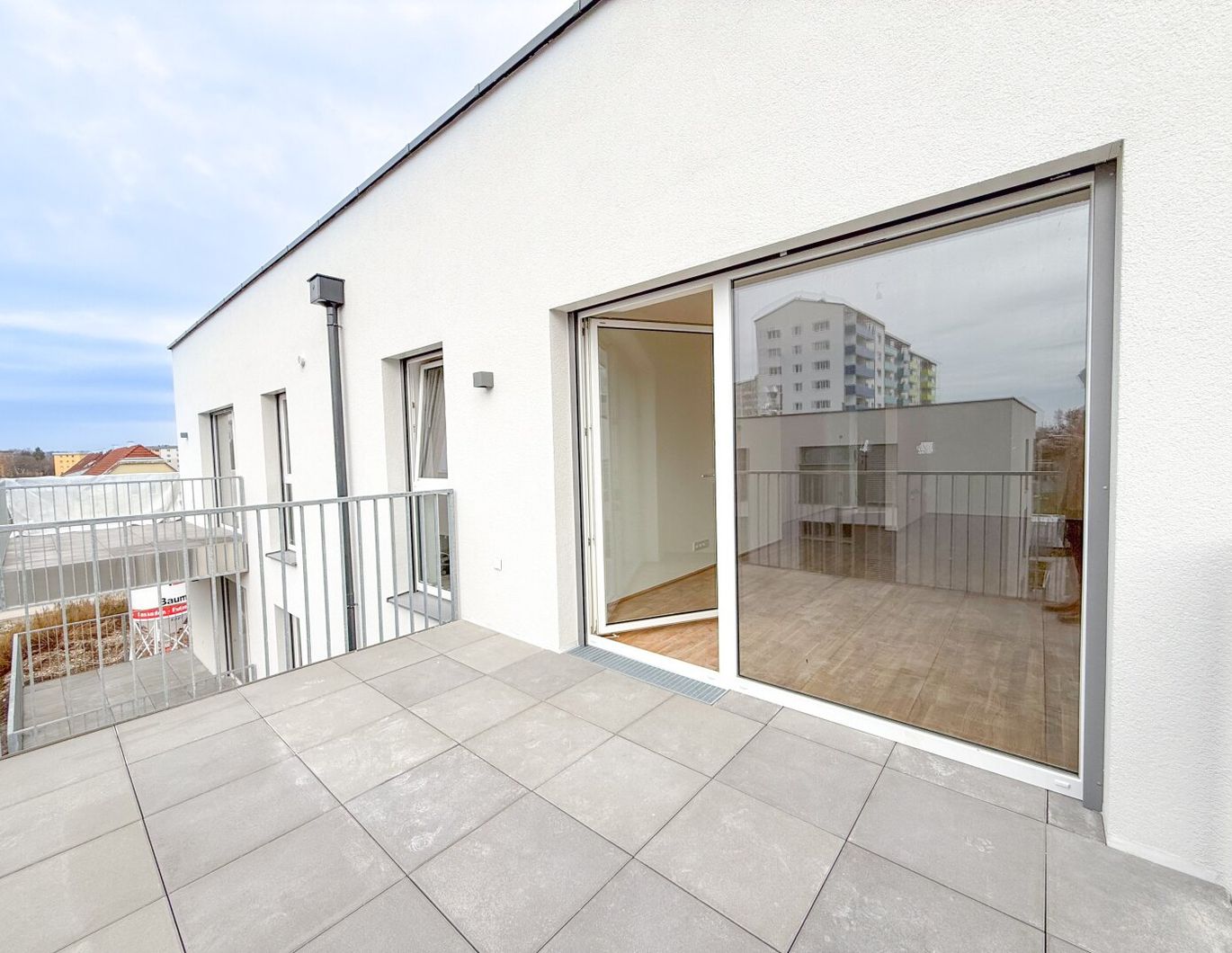 Erstbezug 2-Zimmer-Wohnung in Wels: Balkon, Einbauküche und Fußbodenheizung!