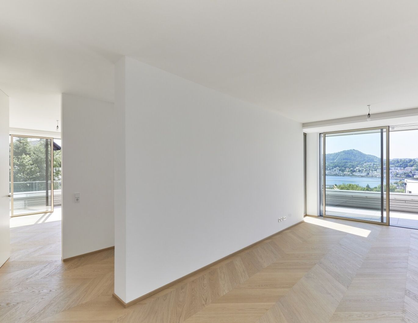 Das Grand Étage - Einzigartiges Wohnen mit Panorama Seeblick und 122m² Eigengarten !!