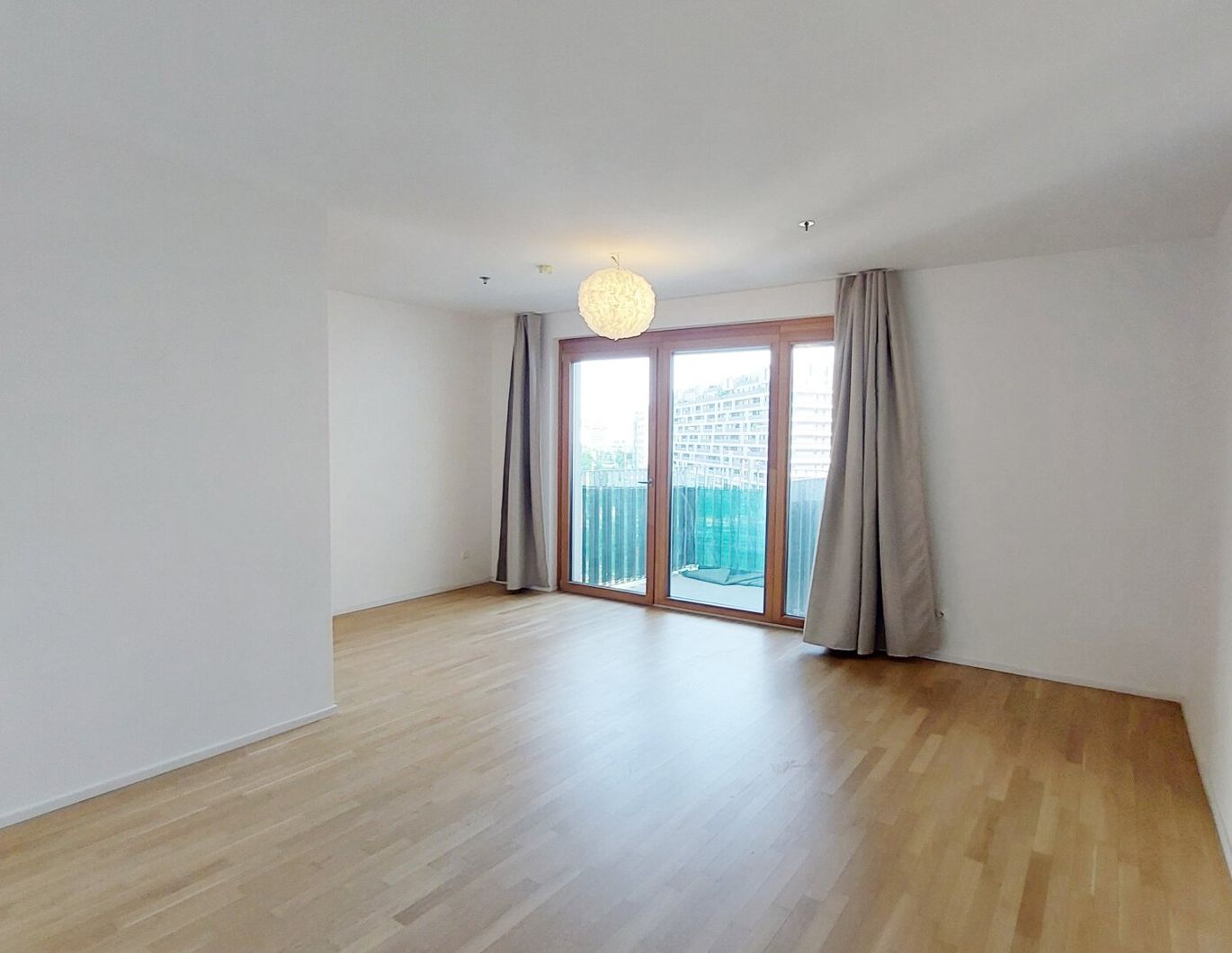 Sonnwendviertel: 1-Zimmer-Wohnung mit Balkon im 12. OG - Fitnessraum, Co-Working & Rooftop-Terrasse inklusive!