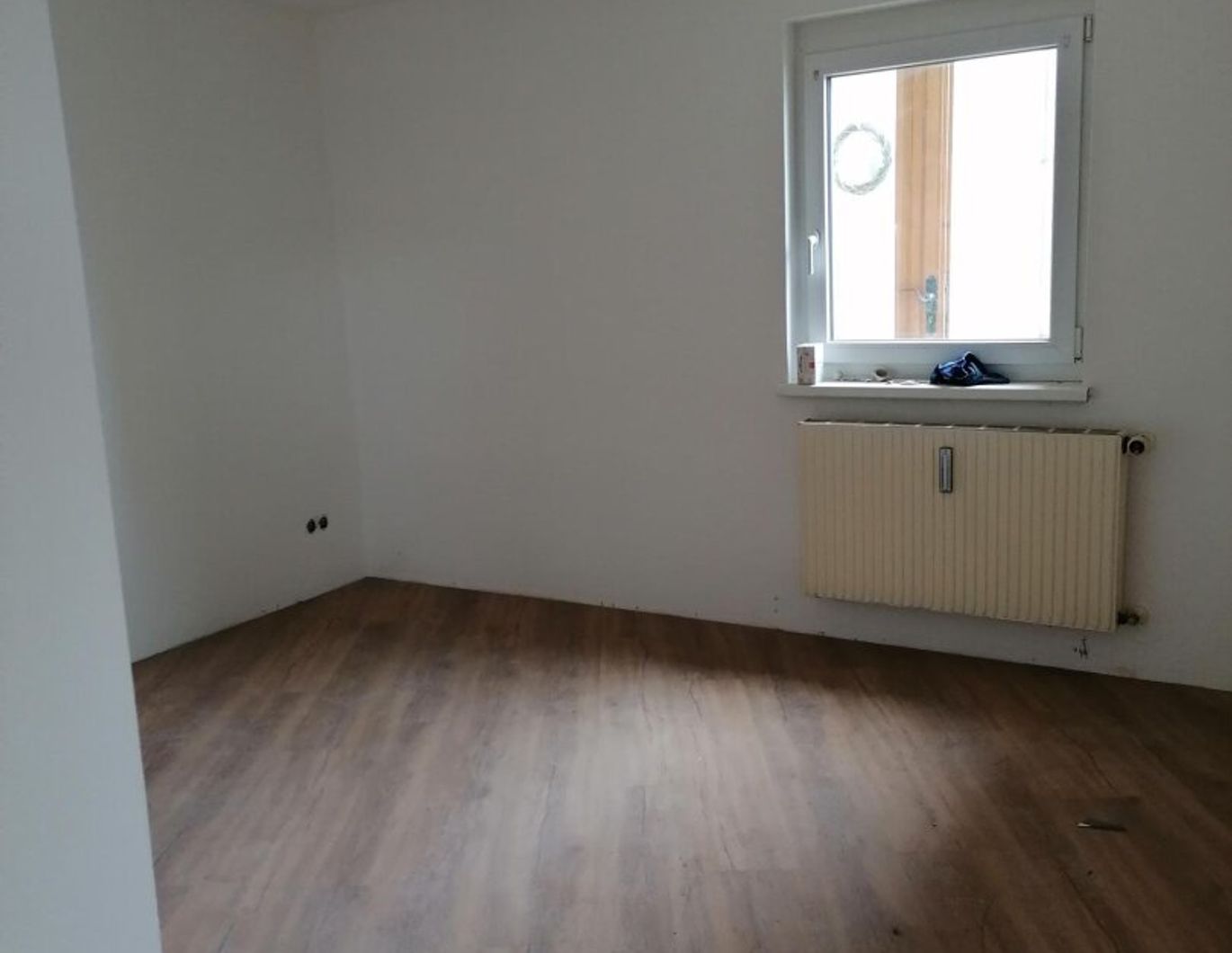 Gemütliche 3-Zimmer-Erdgeschosswohnung mit kleinem Grund