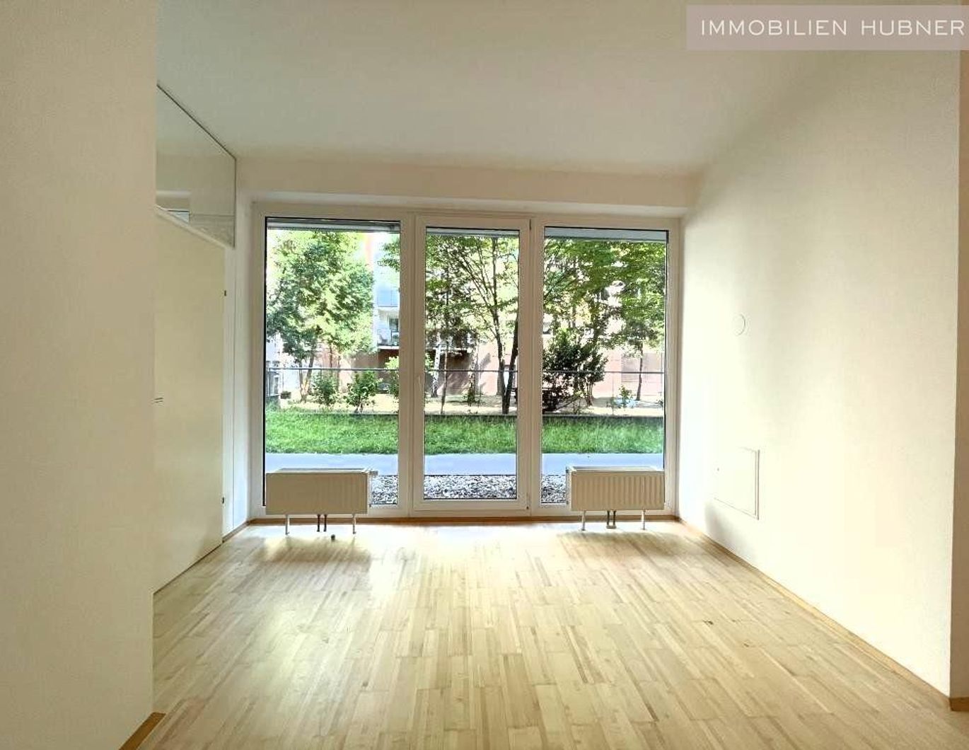 Erdgeschoß, barrierefrei, Innenhof! Ruhige, loft-artige Neubauwohnung mit 2 kl. Terrassen