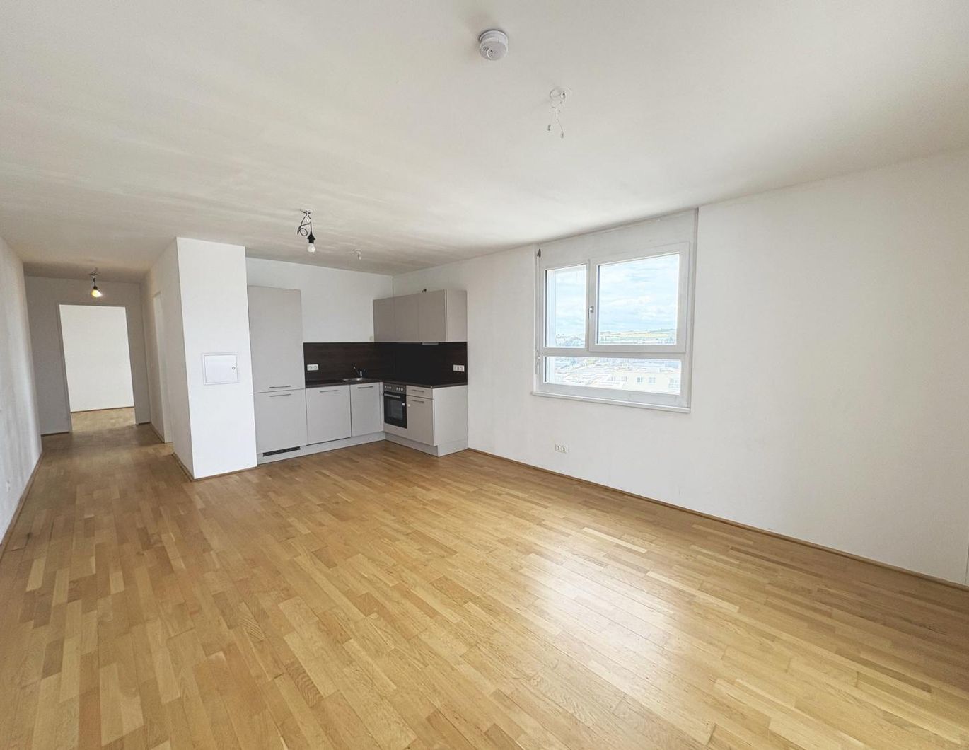 Q11 Leben in Simmering -  3-Zimmer-Loggiawohnung mit Deckenkühlung - genießen Sie DIESEN Ausblick!