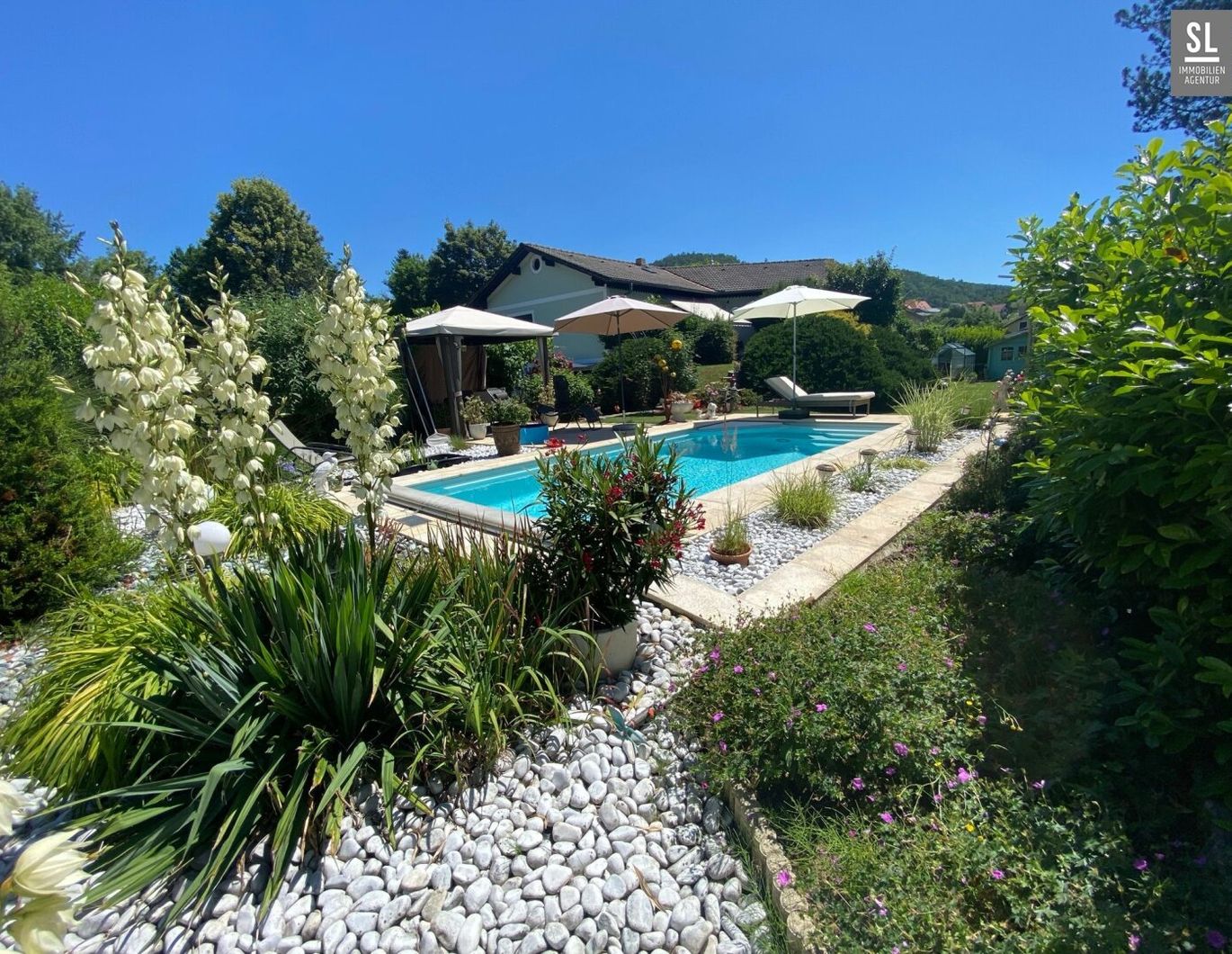 DER besondere Bungalow mit schöner Gartenanlage, großem Pool und PV Anlage in der Nähe vom Thalersee im Grazer Naherholungsgebiet