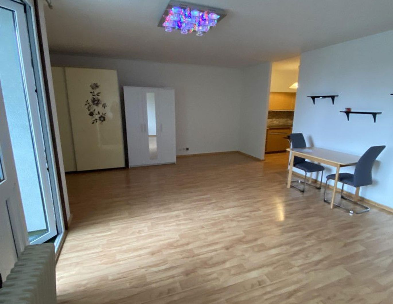 Zentrale Wohnung mit Tiefgaragenplatz & Balkon