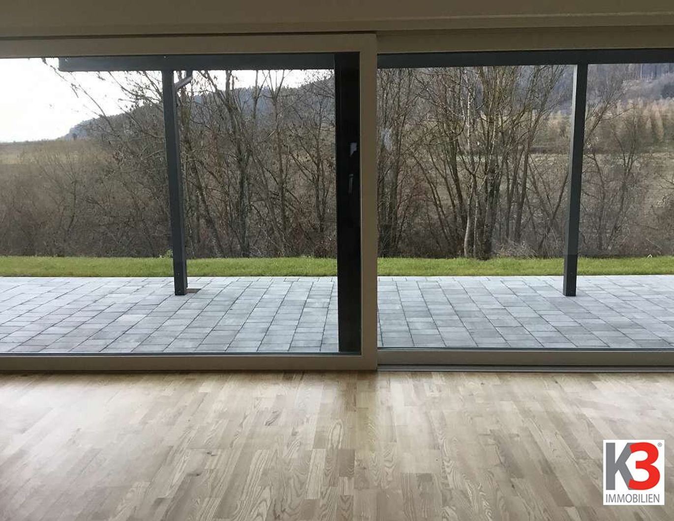 K3 - LEISTBARER LUXUS. Traumhaftes Einfamilienhaus im Erstbezug. Hochwertige und elegante Ausführung.. Carport. Doppelhausanlage. Unverbaubarer Fernblick nach Süden.