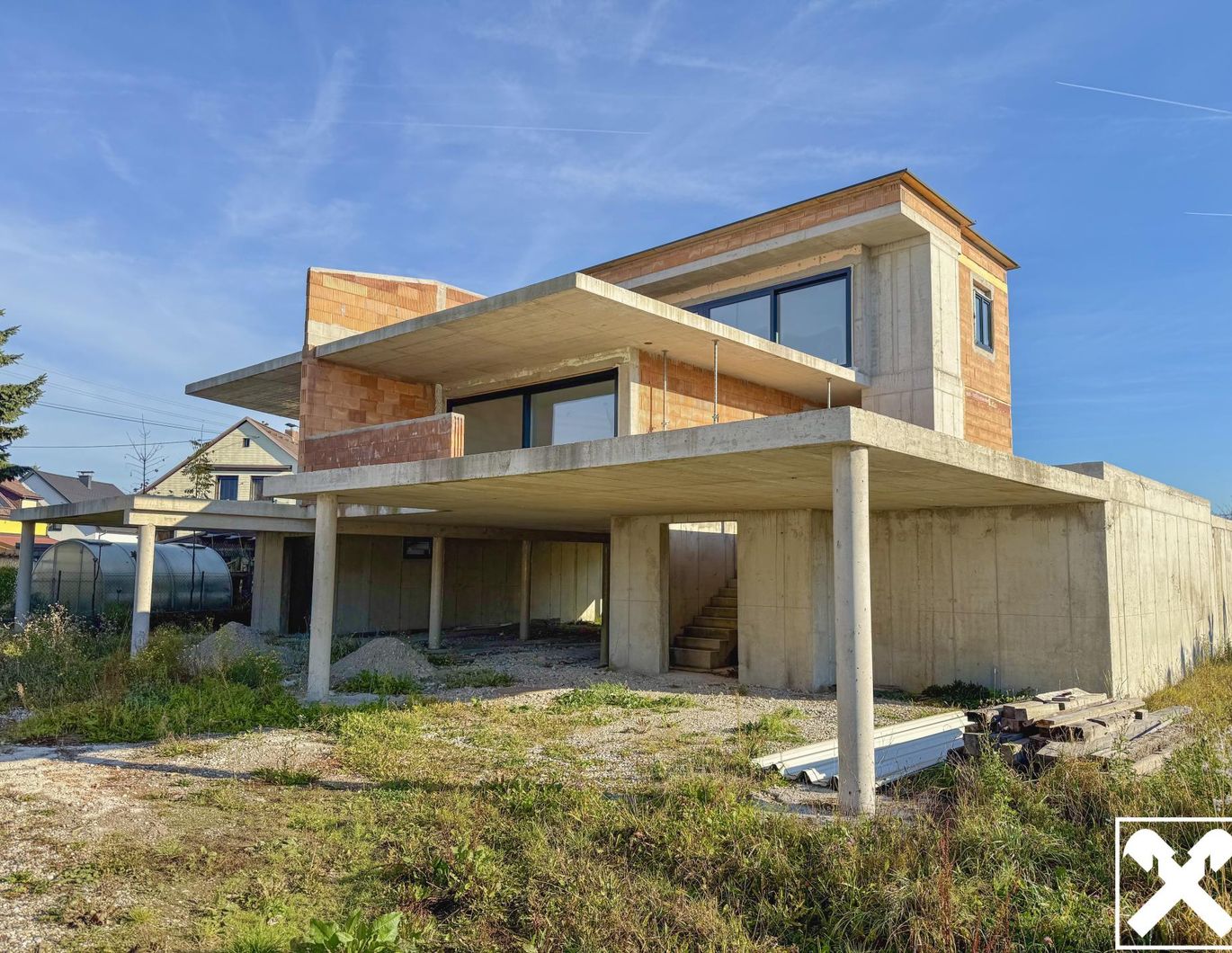 Zwei Einheiten, eine Vision - moderne Architektur in Rohform