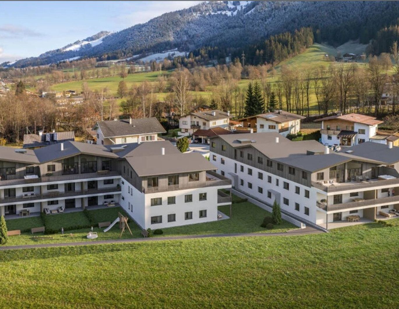 Optimal aufgeteilte DG-Wohnung A13 in Söll: Erstbezug mit Terrasse und Bergblick