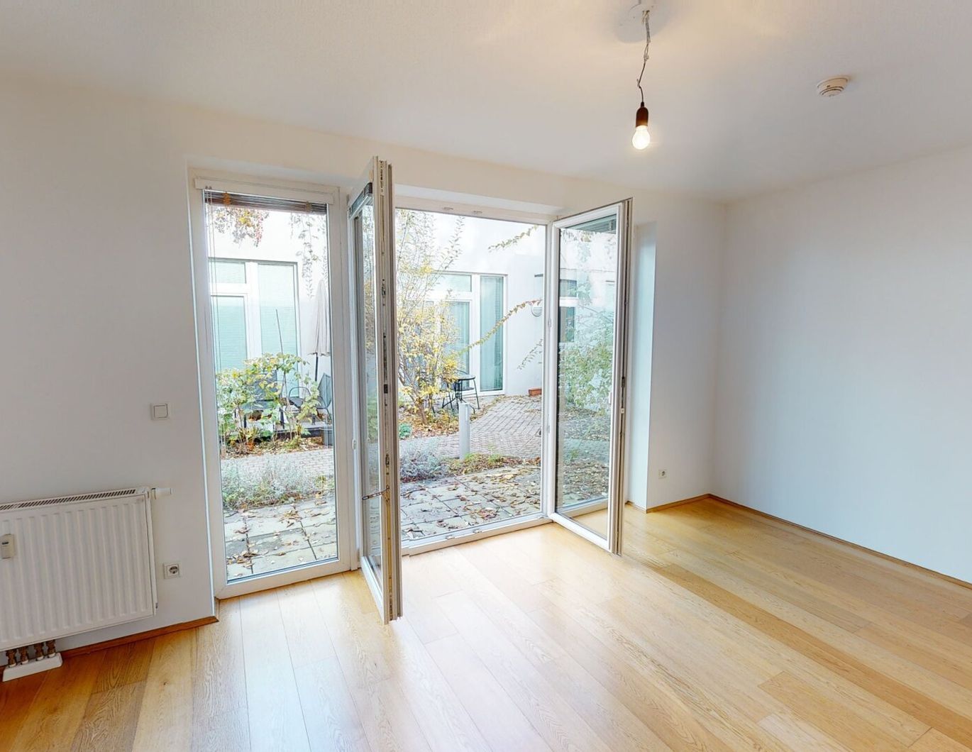orea | Gemütliche 2-Zimmer-Wohnung mit Terrasse im ruhigen Innenhof | Smart besichtigen · Online anmieten