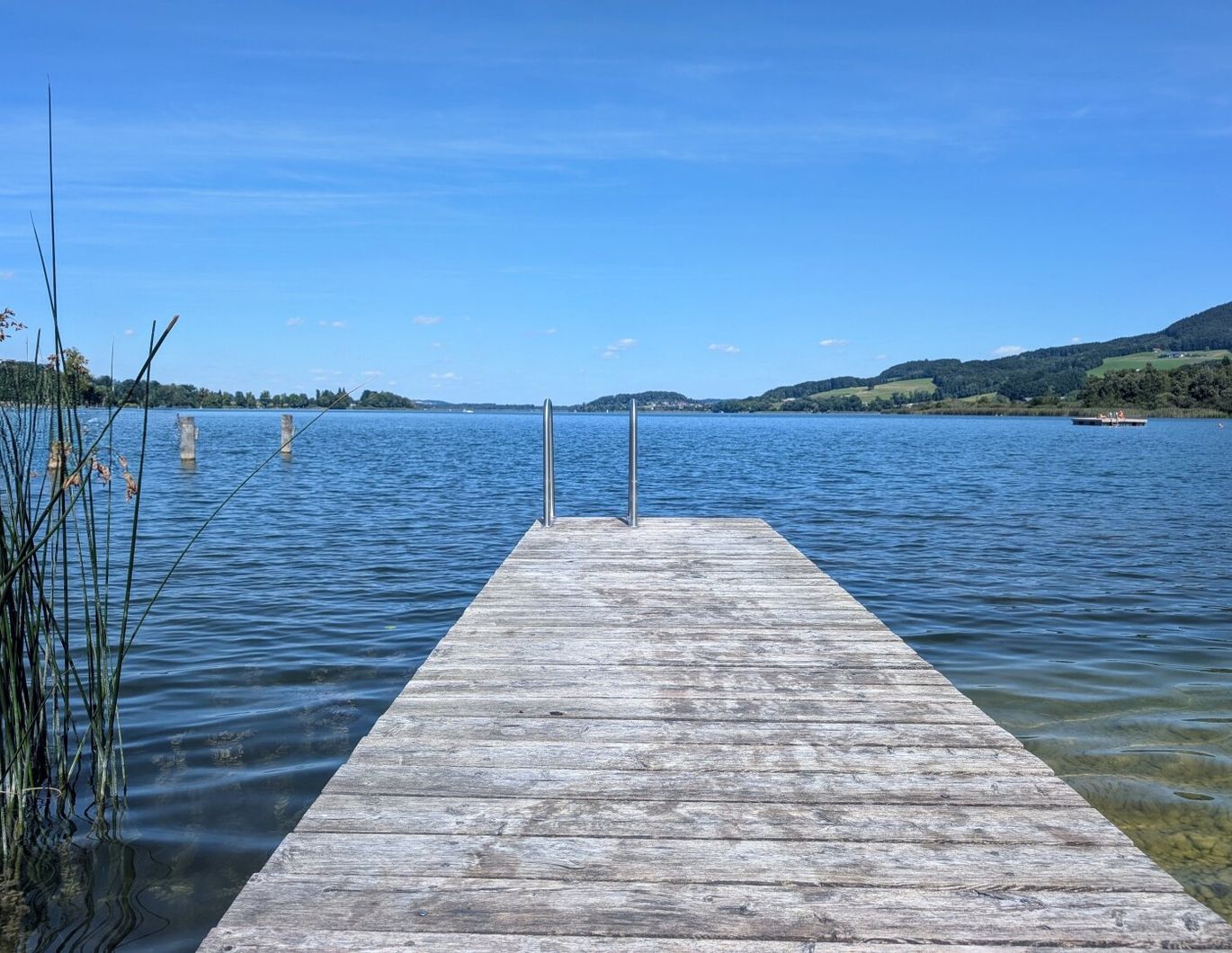 Seedomizil in Bestlage am Obertrumer See: Großzügige Erstbezugs-Terrassenwohnung mit eigenem Badehaus und Steg!