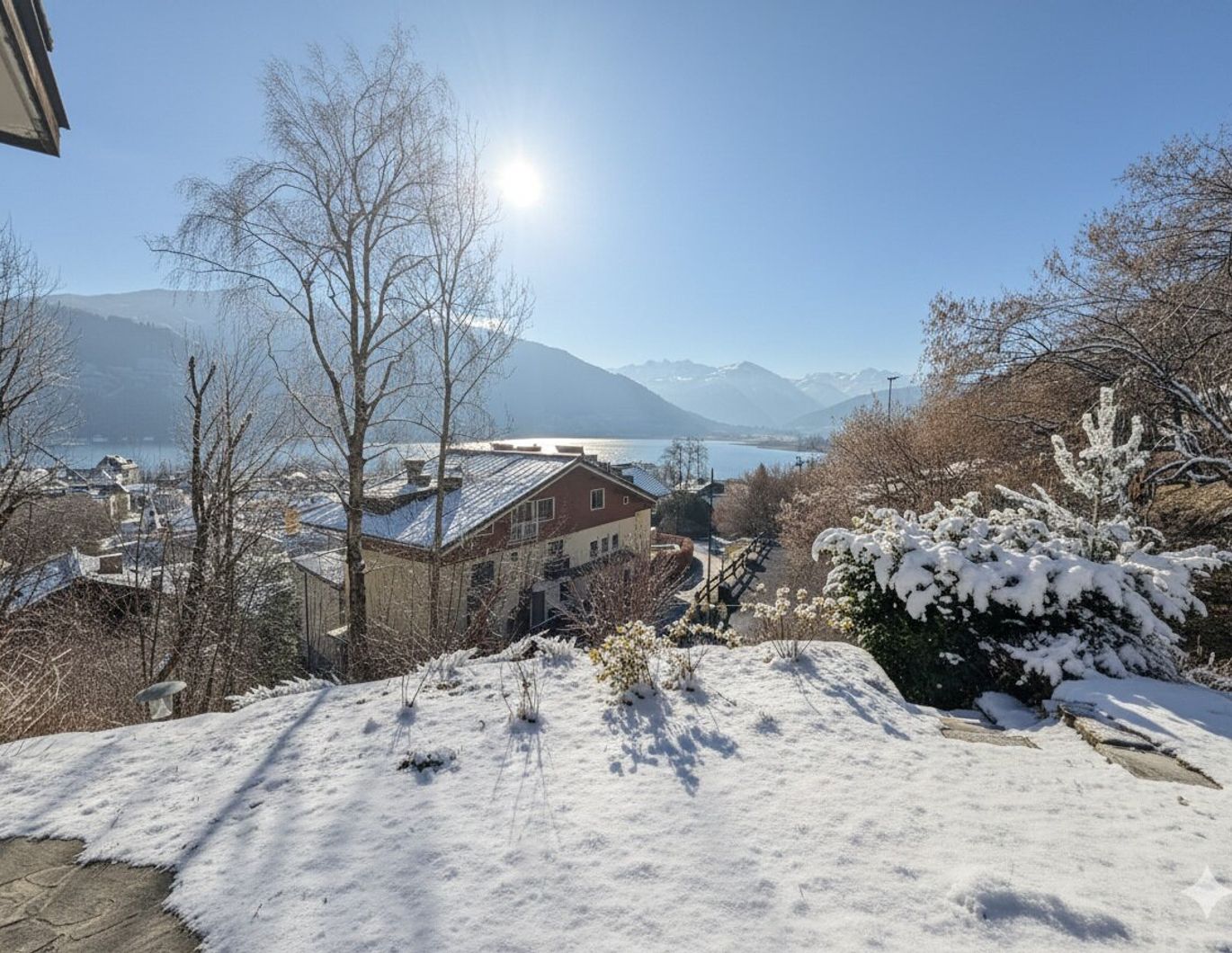 Traumhafte Gartenwohnung in Zell am See mit herrlichem Seeblick, Ski in Ski out!