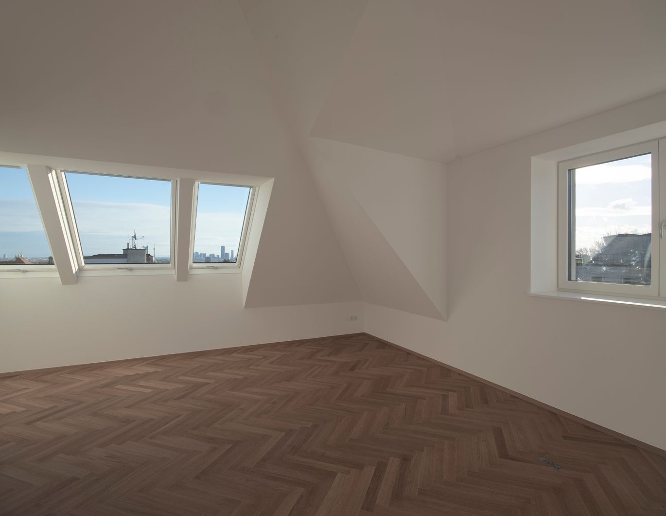 Exklusive Dachgeschoss-Wohnung mit Loft-Charakter und moderner Luftwärmepumpe - in Bau