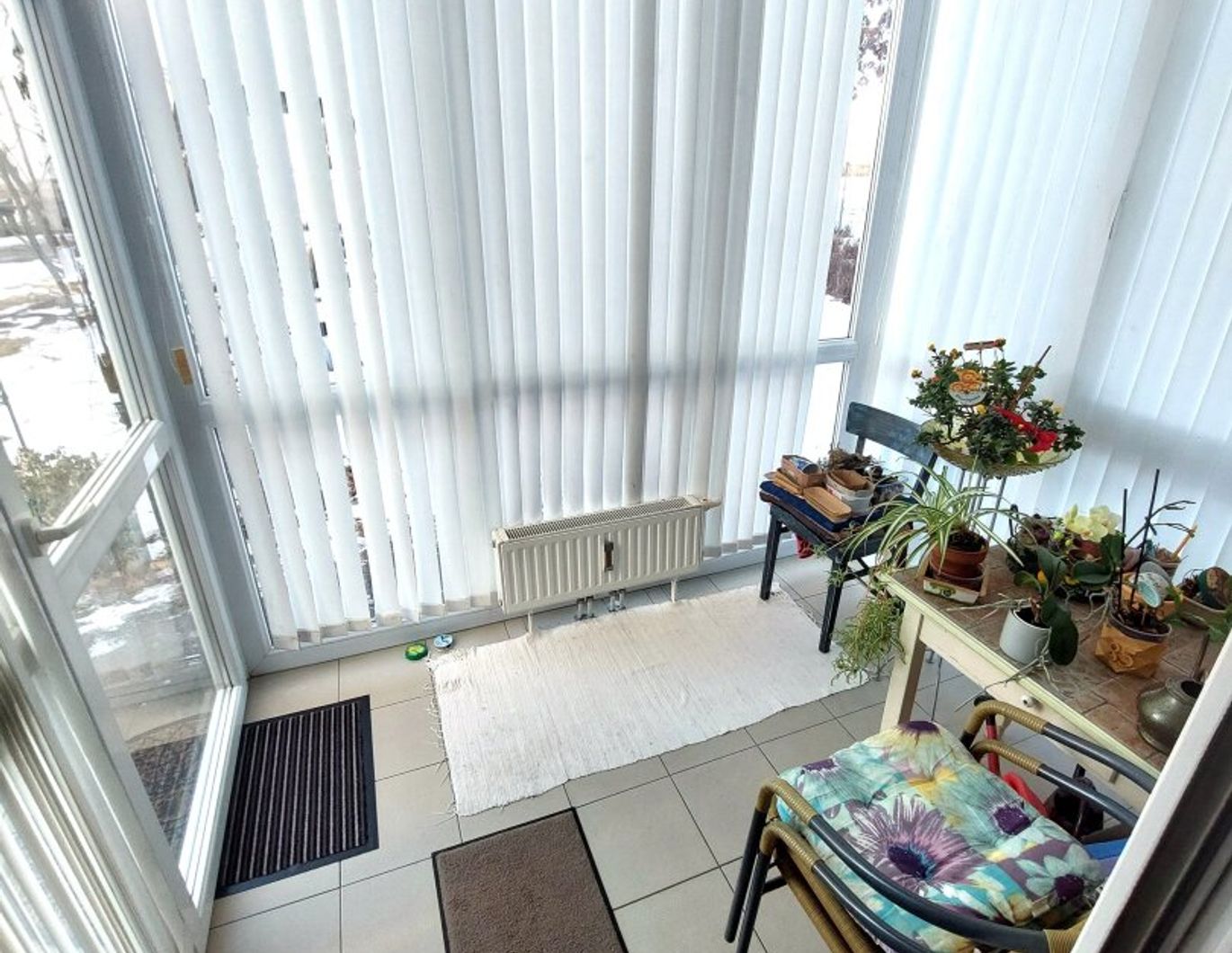 Großzügige Wohnung mit Wintergarten und kleiner Terrasse