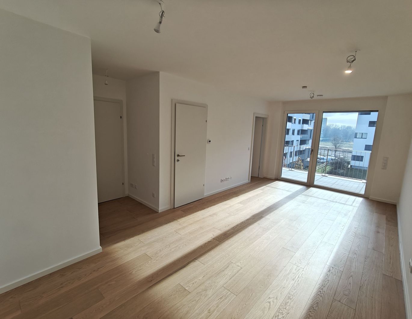 [ERSTBEZUG] Moderne 2-Zimmer-Wohnung (53,60 m²) mit Loggia - U1 Nähe