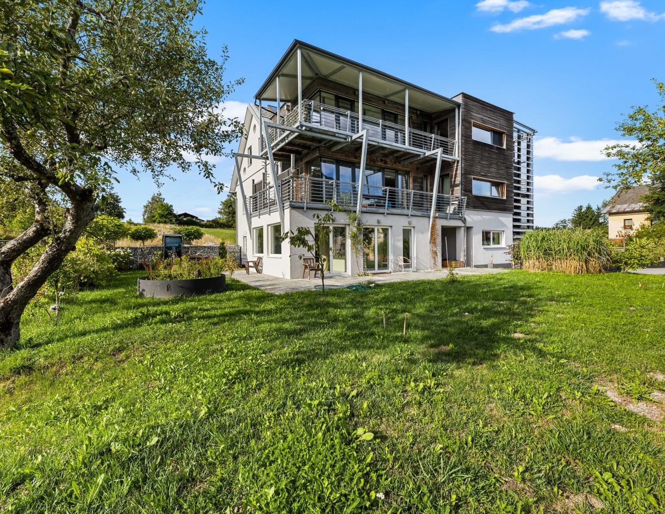 Moderne Dachgeschosswohnung am Aichwaldsee mit privatem Seezugang!