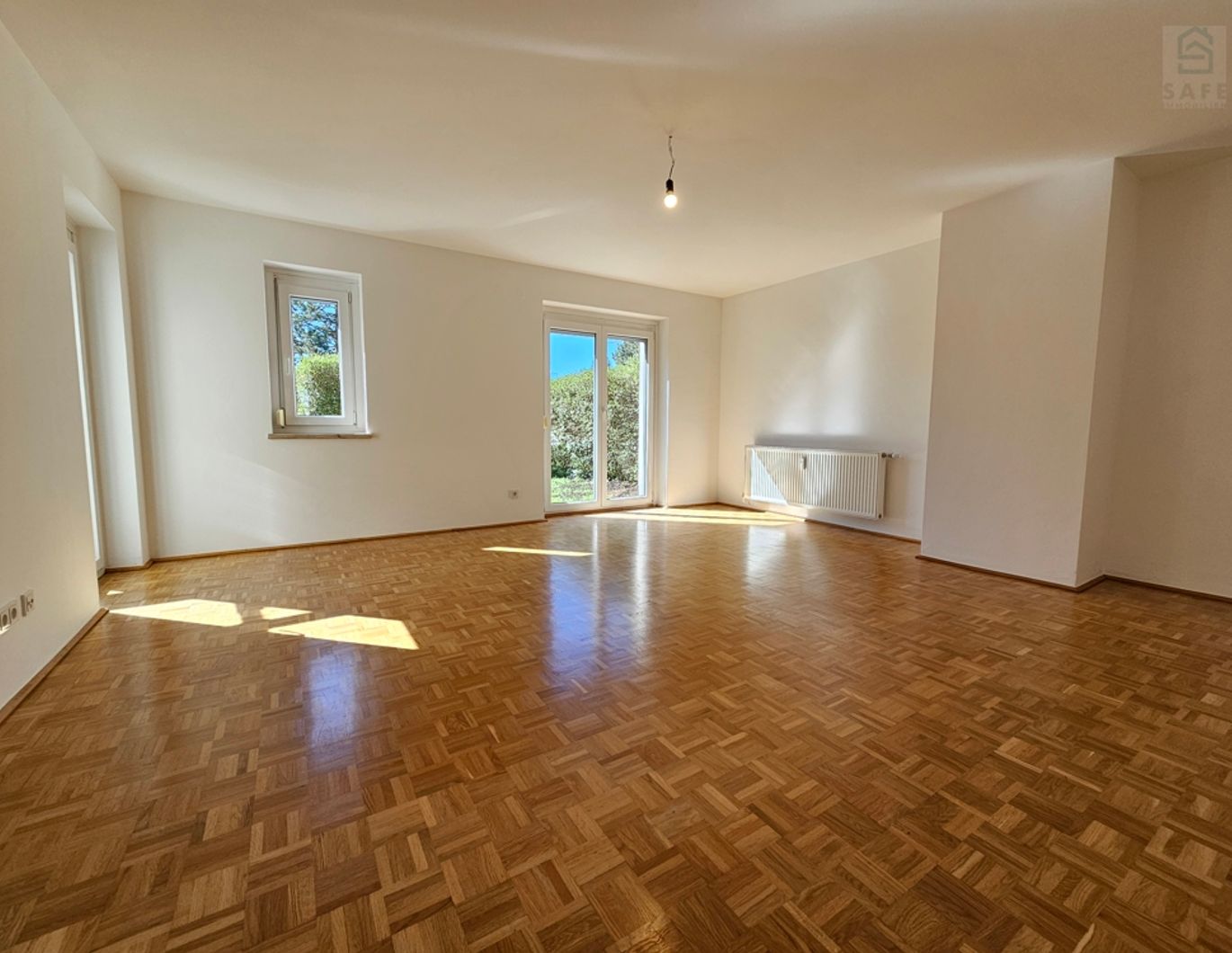 Gepflegte, helle Gartenwohnung in See- und Zentrumsnähe mit Tiefgaragenplatz!