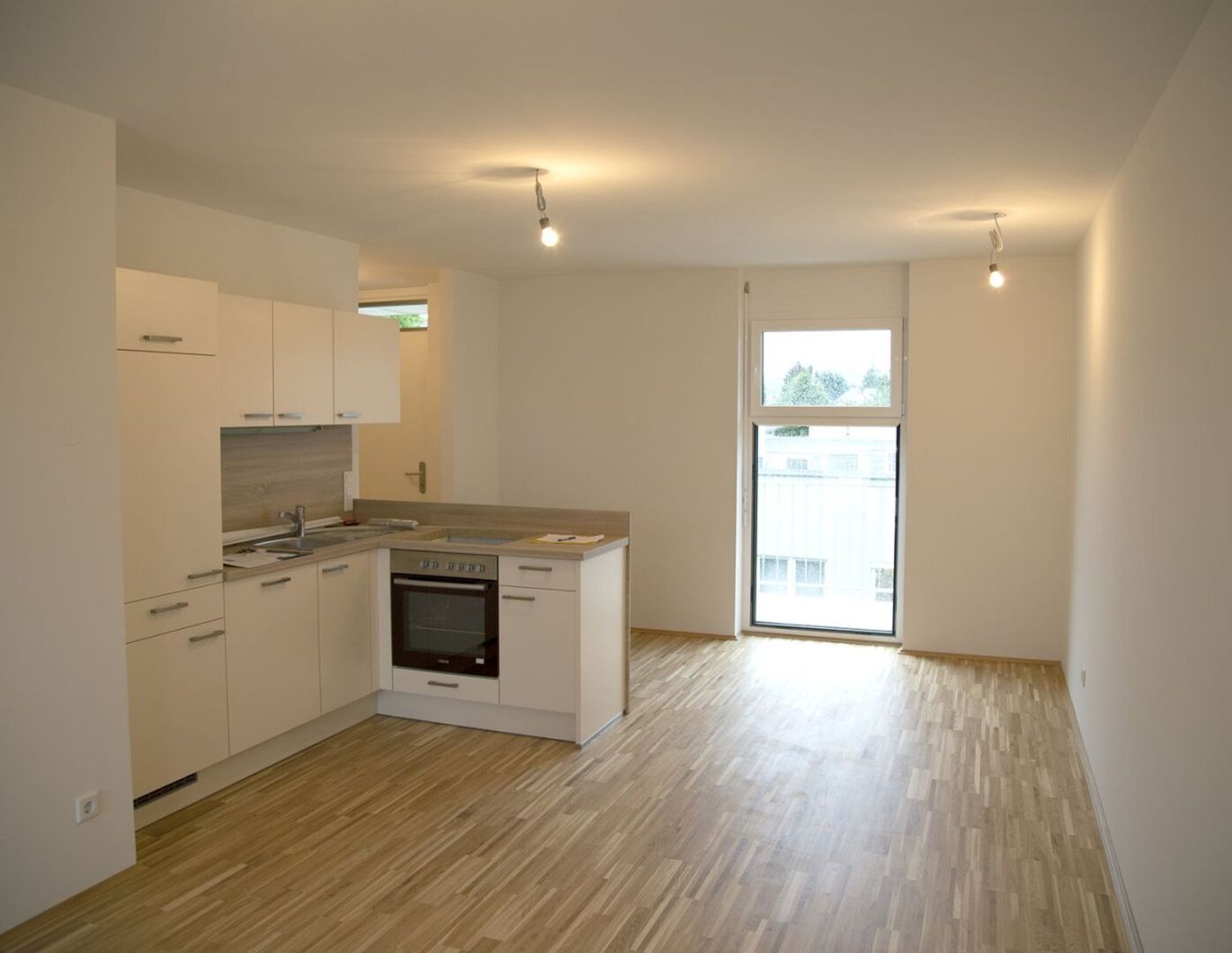 Dachgeschosswohnung mit traumhafter Terrasse und Tiefgaragenparkplatz in Liebenau