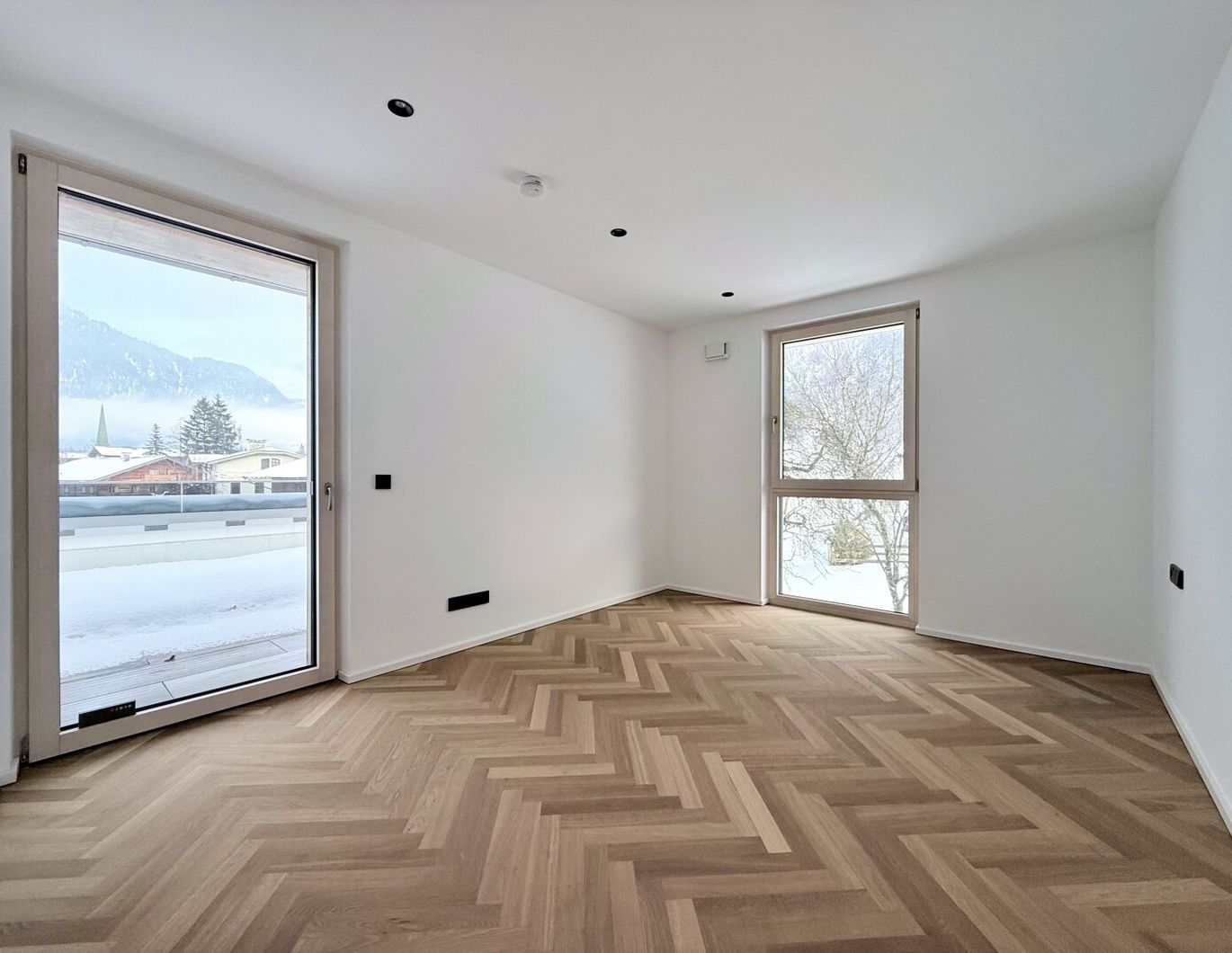 Erstbezug: 112 m² Dachgeschosswohnung mit Traumterrasse & 2 Tiefgaragenplätze in Erpfendorf