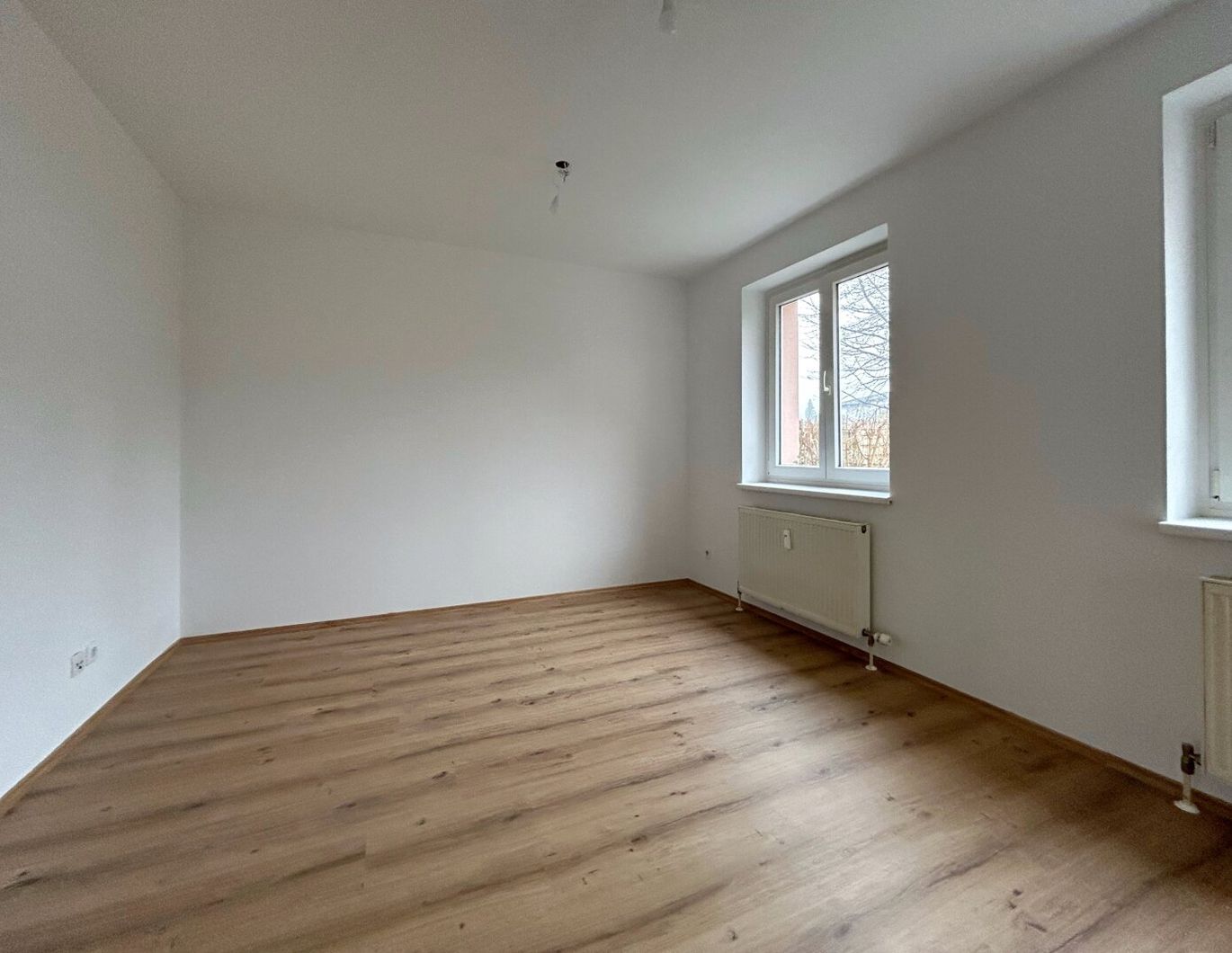 GARTENWOHNUNG IN KIRCHDORF MIT 3 ZIMMER, PARKPLATZ UND KELLER