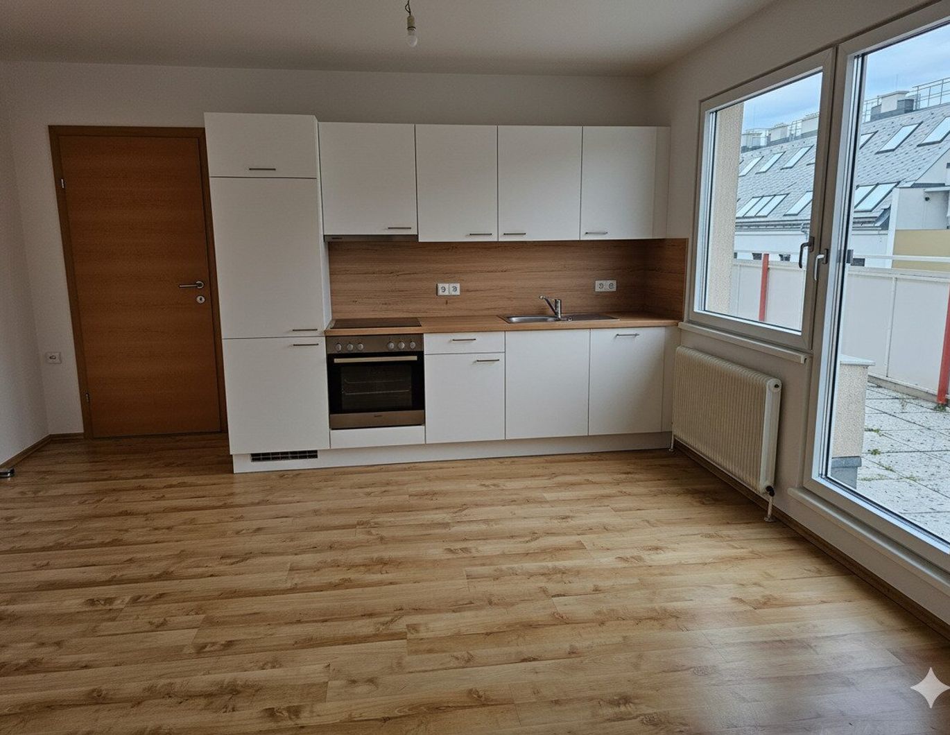 Helle 3 Zimmer Wohnung mit 31m² Terrasse, neue Küche, im fünften Liftstock,Gemeinschaftsgarten & Fitnessraum