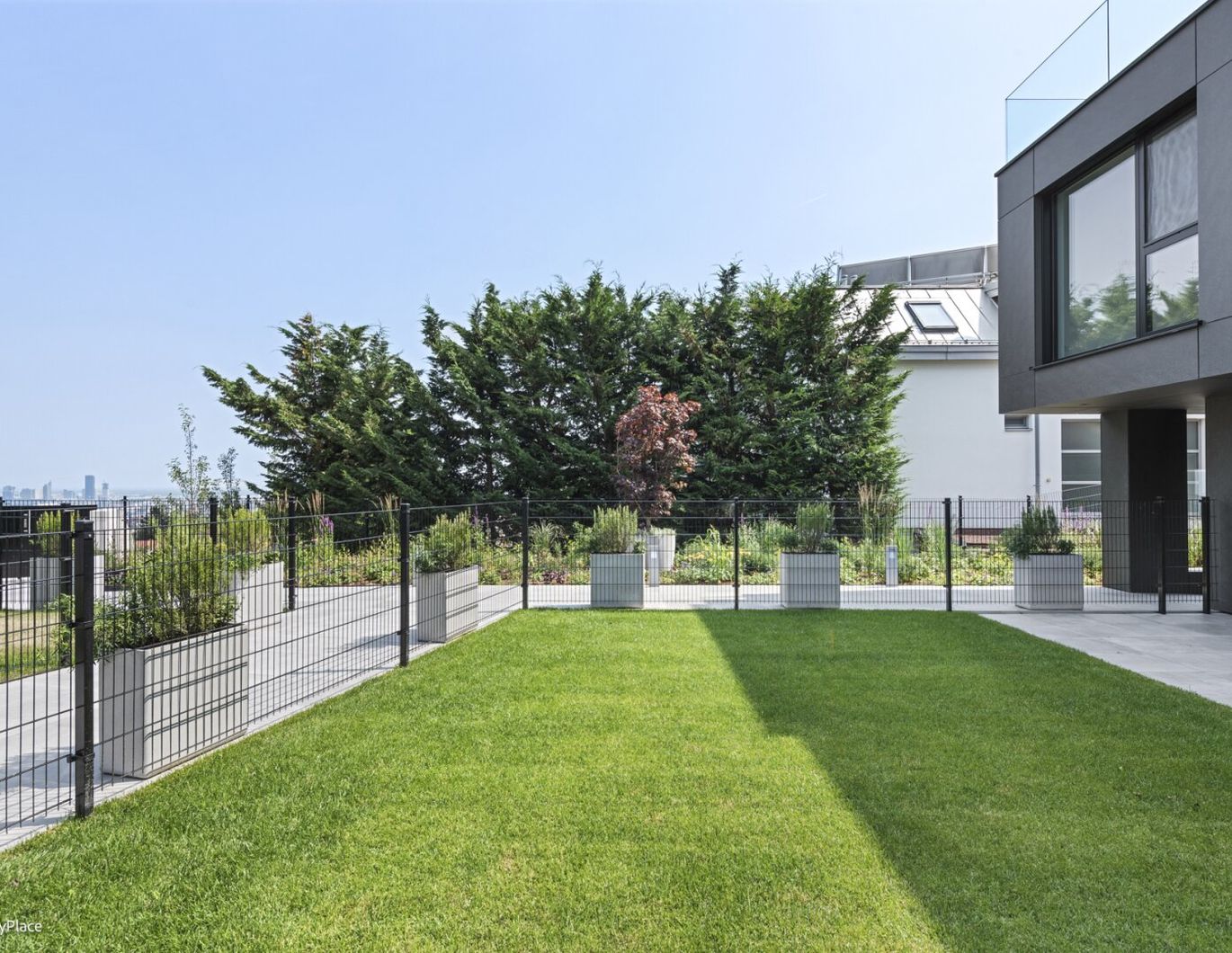 Erstbezug! Charmante 2-Zimmer Wohnung mit Garten und Blick über Wien