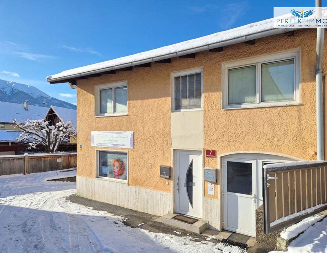 Haus mit Wohnung und Gewerbe