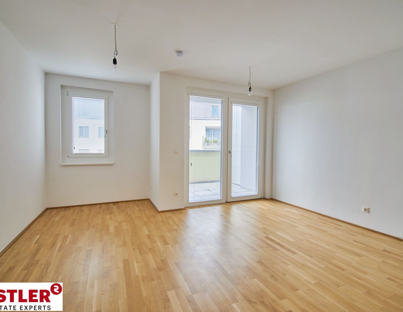 Innehoflage mit Balkon