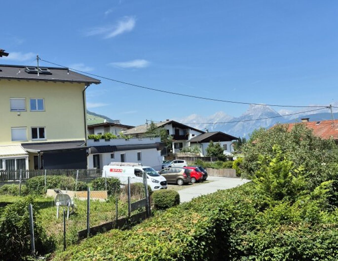 Wohnung mit Balkon, Gemeinschaftsgarten, AAP und Garage in Axams