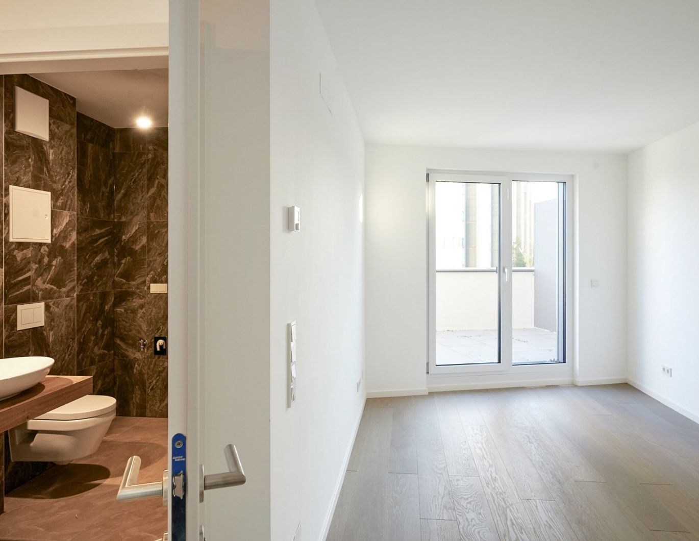 Sonnige 2-Zimmer-Terrassenwohnung in grüner Oase nahe der Donau! ERSTBEZUG!