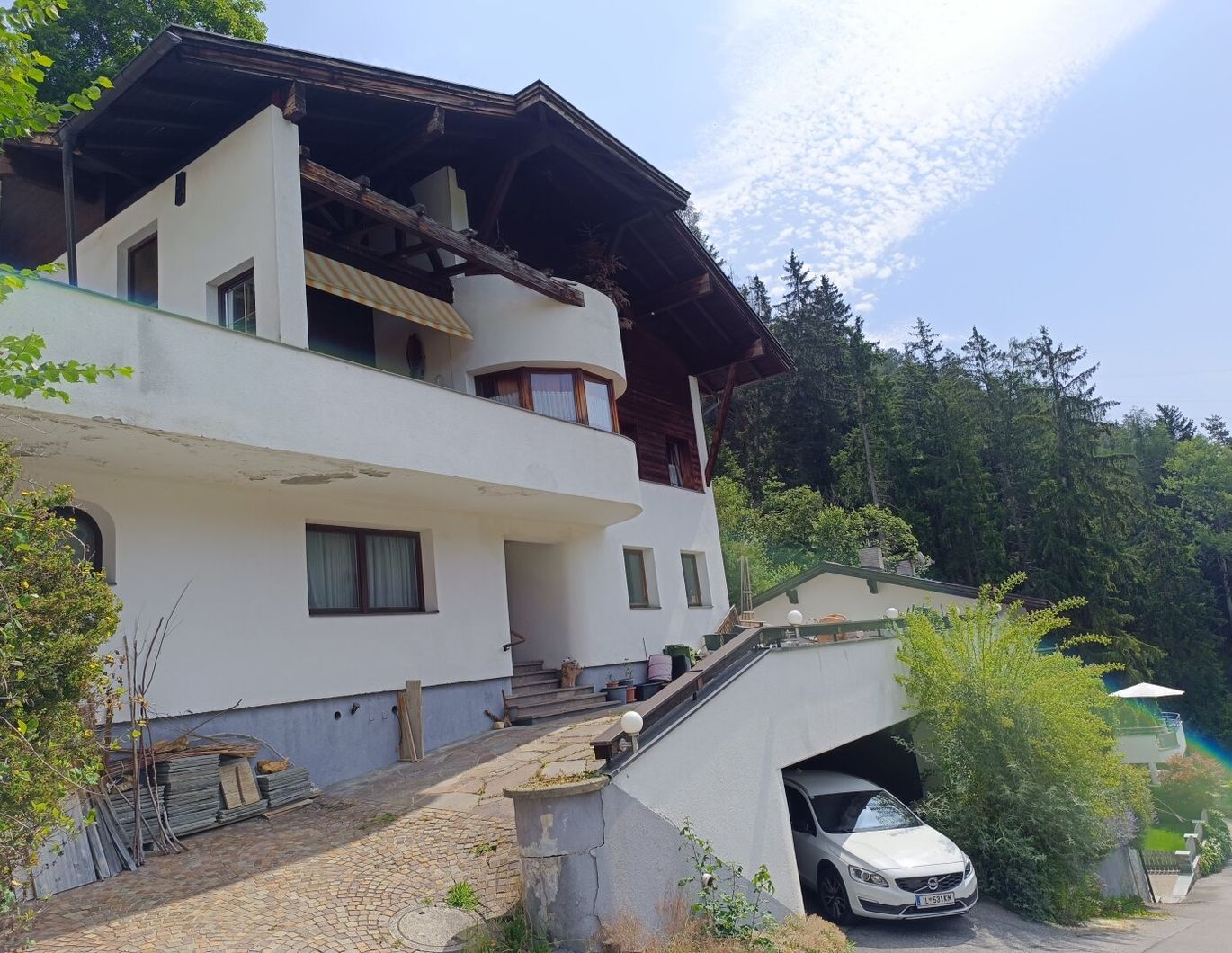 Haus in 0mes 180m² mit Garten, Garage und atemberaubendem Bergblick!