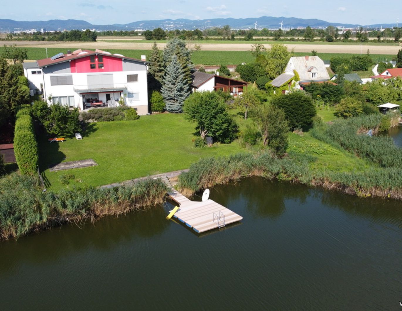 Generationenhaus mit bis zu 4 eigenen Wohnbereichen auf Seegrundstück (Eigentum) vor den Toren Wiens