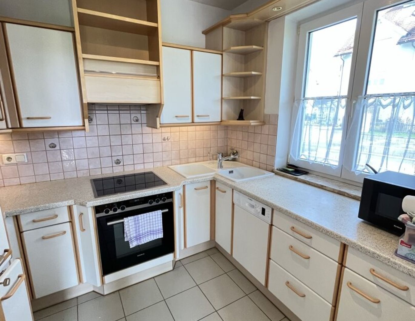 3-Zimmer Wohnung mit Eigengarten und PKW-Stellplatz