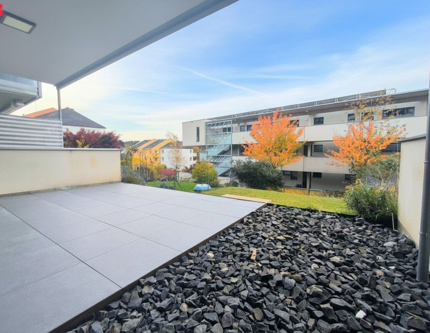 Lichtdurchflutet & modern - Gartenwohntraum in grüner Ruhelage