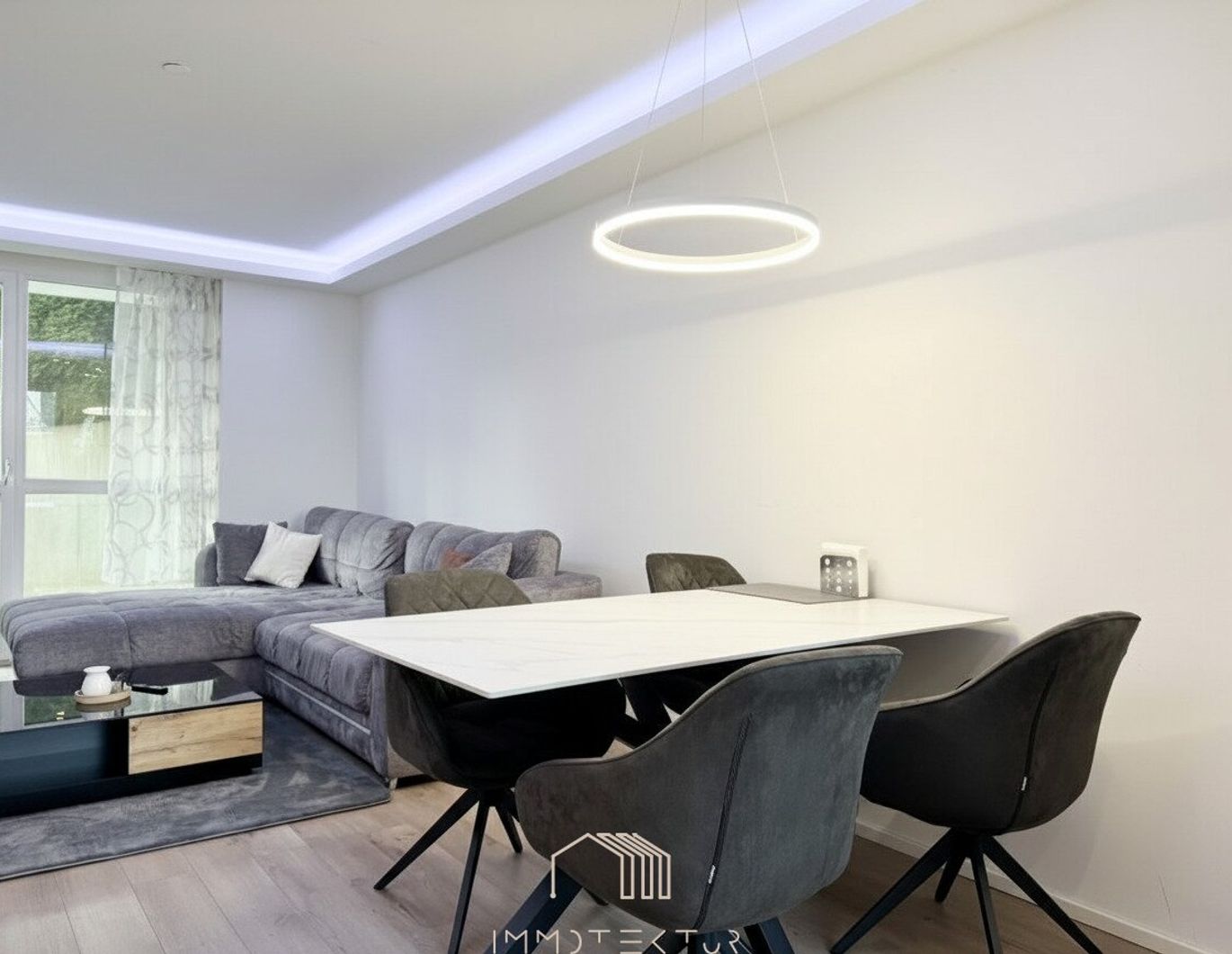 EIGENGARTEN: Modernisierte 2-Zimmer-Wohnung mit Tiefgarage und großem Kellerabteil