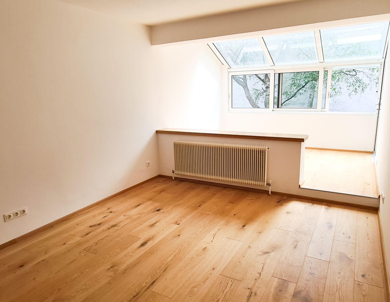 2-Zimmer-Neubauwohnung mit großer Terrasse & Wintergarten