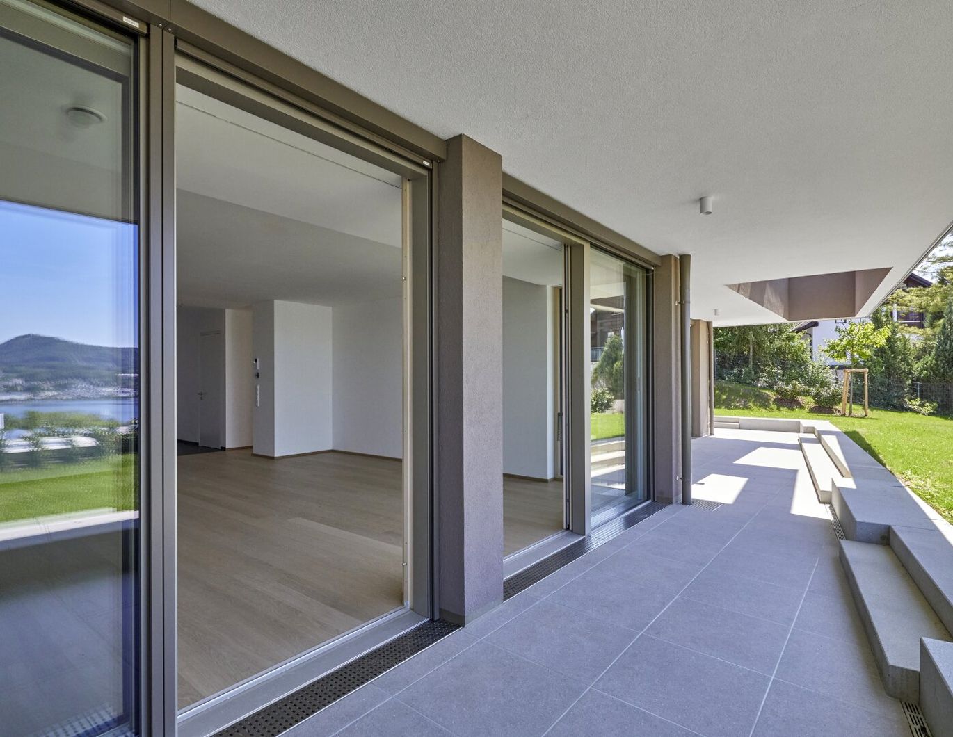 Bellevue Garten Suite - 4 Zimmer Wohnung mit 290 m² Privatgarten und Seeblick !!