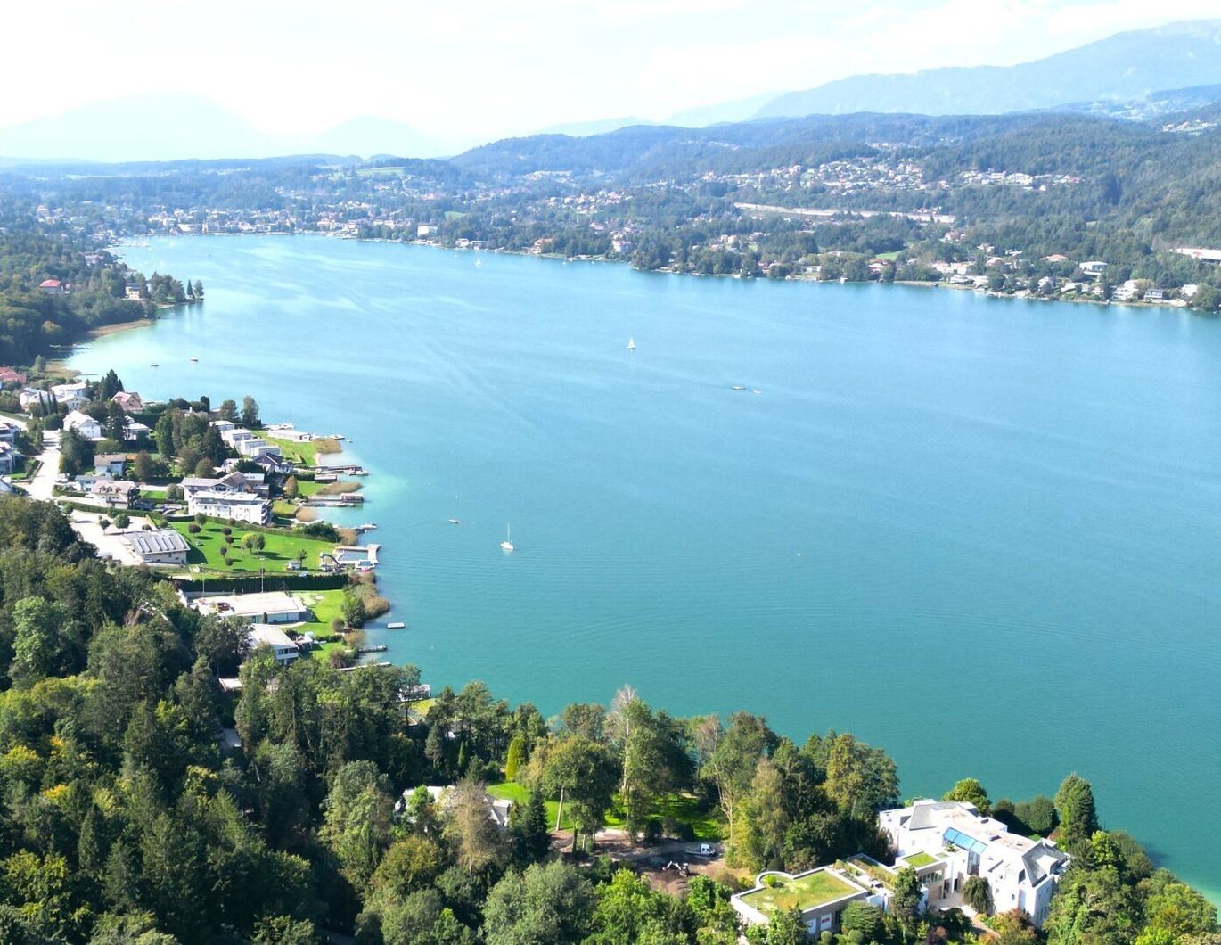 Gartenwohnung mit teilweisem Wörtherseeblick! Möblierter Erstbezug!