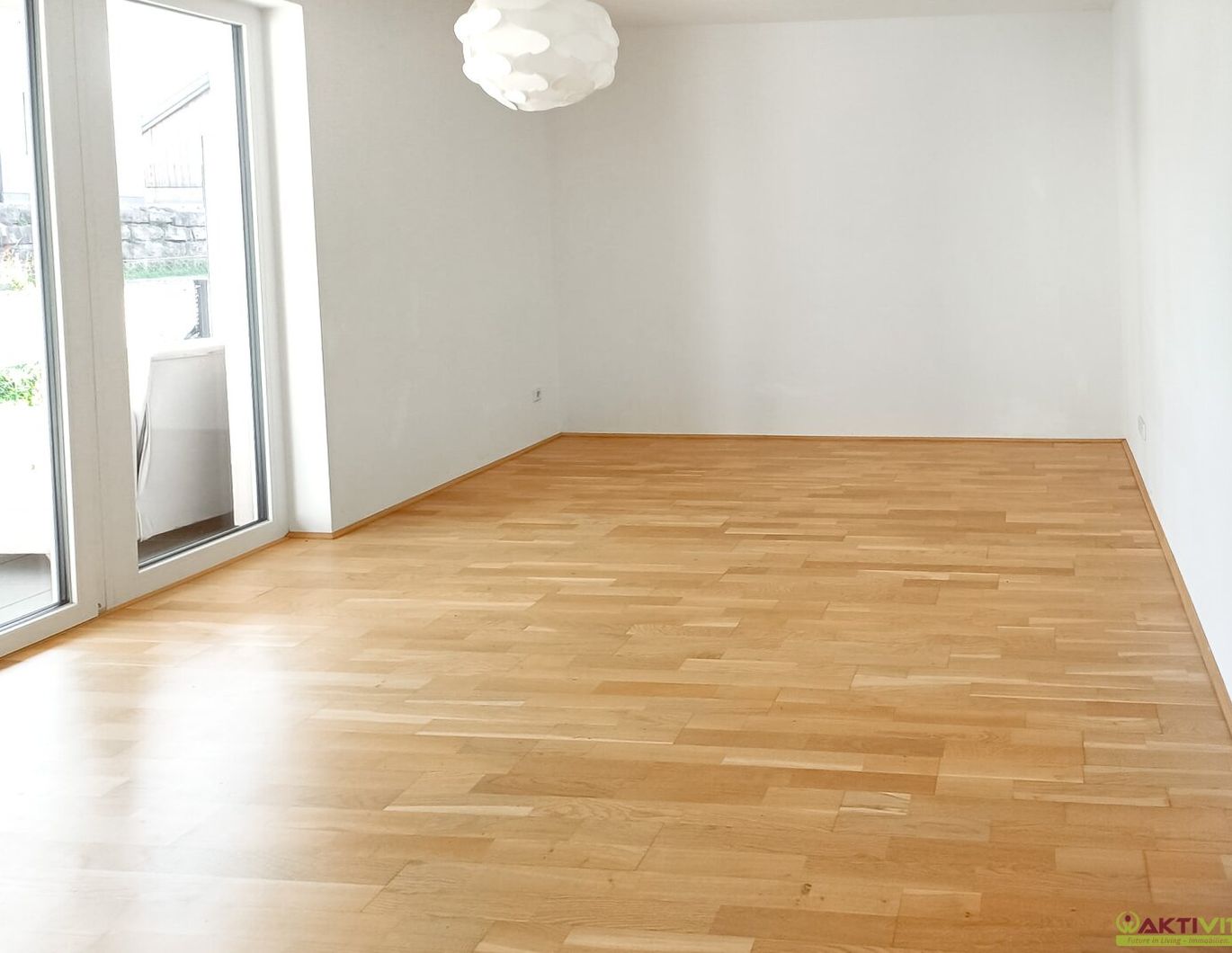 Neuwertige 2-Zimmer-Neubauwohnung mit Eigengarten in Eggelsberg.