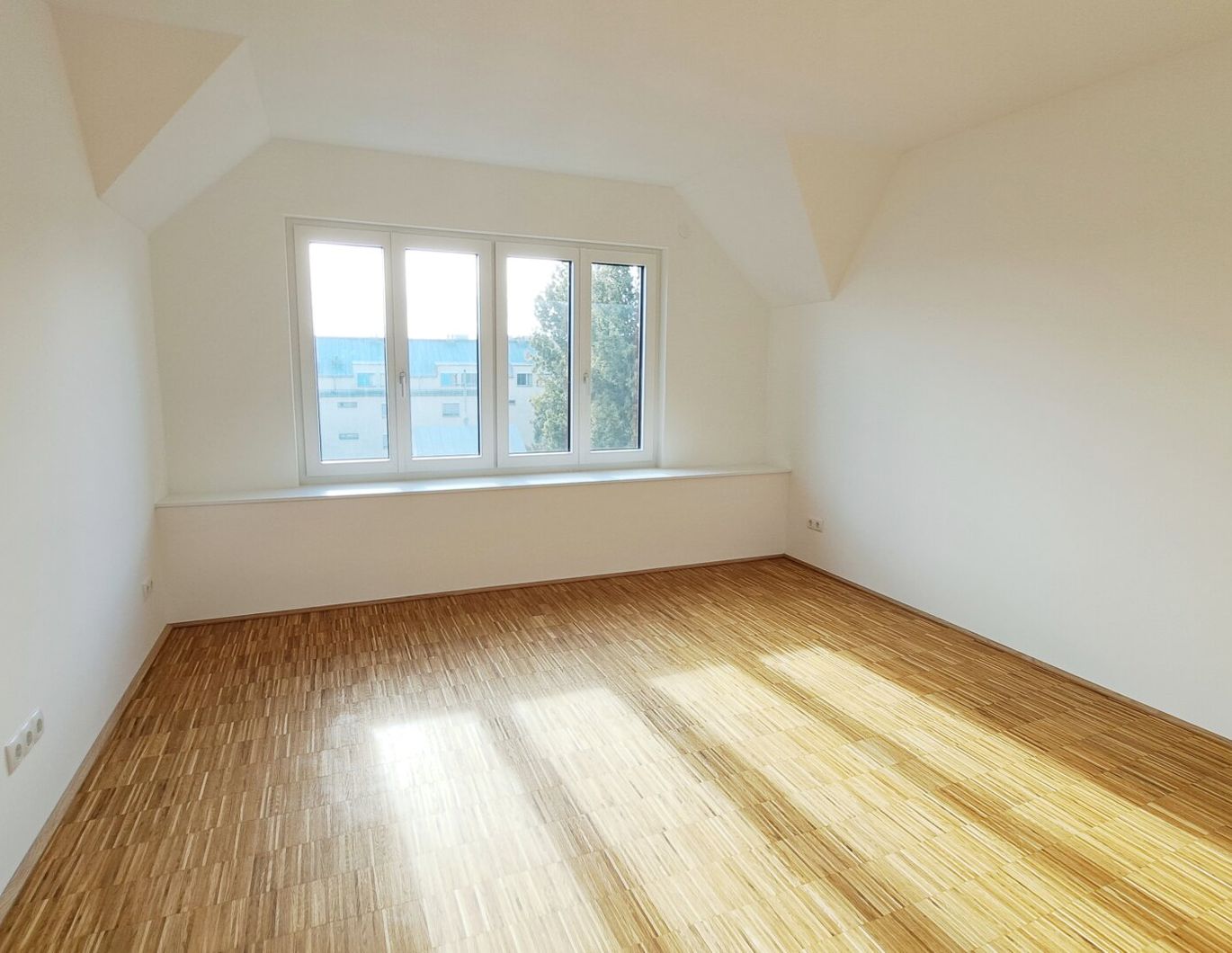 Wohnen über den Dächern Wiens - moderner Dachgeschossausbau auf charmantem Altbau