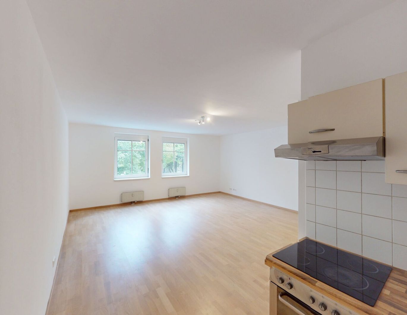 Helle 2,5-Zimmer-Wohnung im 2. Liftstock - ruhige Lage mit Grünblick & optionalem Garagenplatz