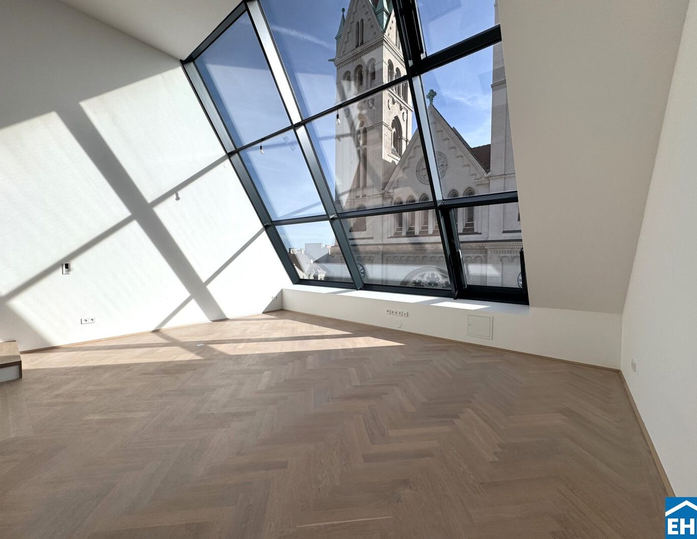 Spektakuläre Dachgeschoßmaisonette mit Terrassentraum und Blick auf die Canisiuskirche