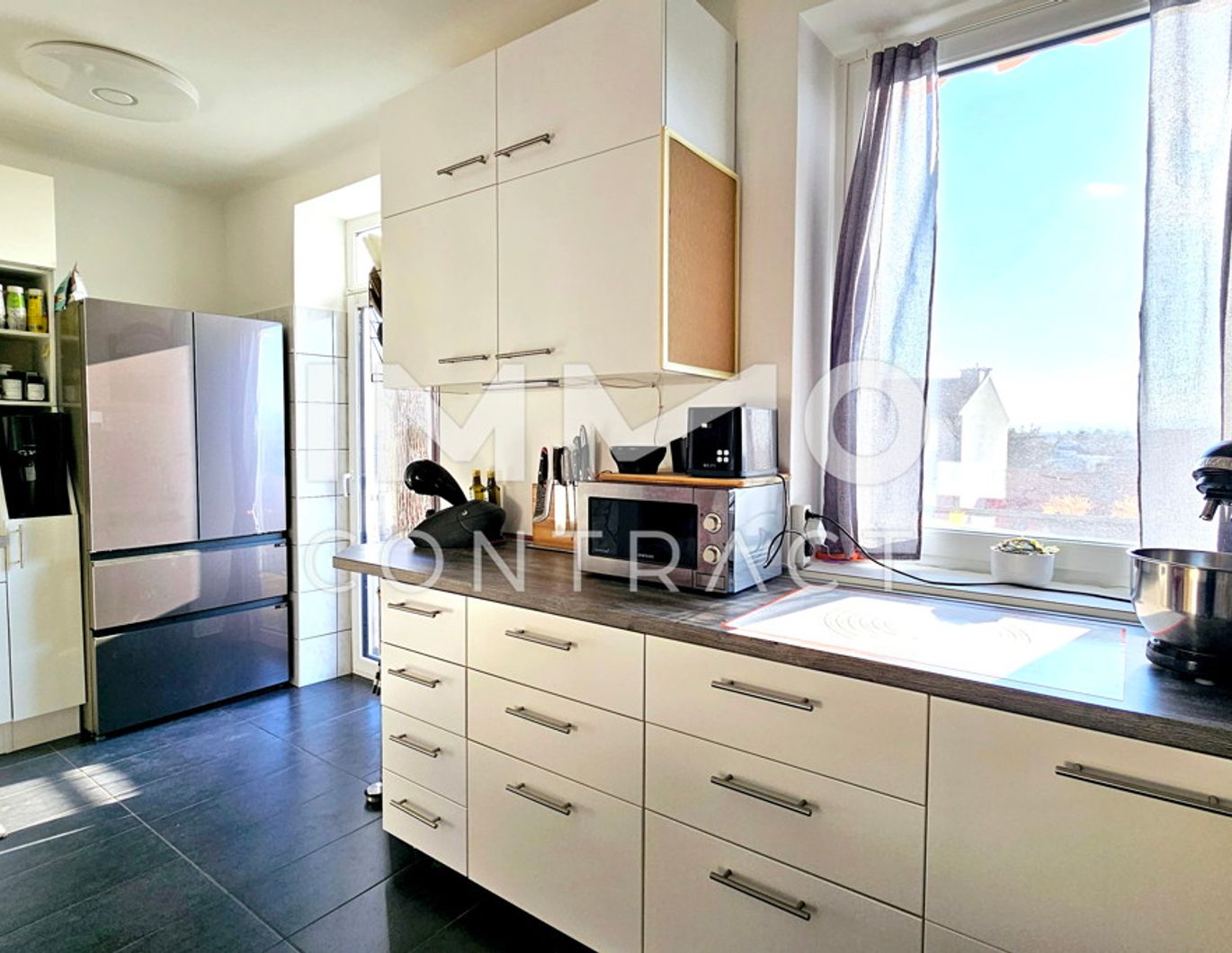 Lichtdurchflutete, große 3-Zimmer-Wohnung mit Balkon und Garage in attraktiver Lage