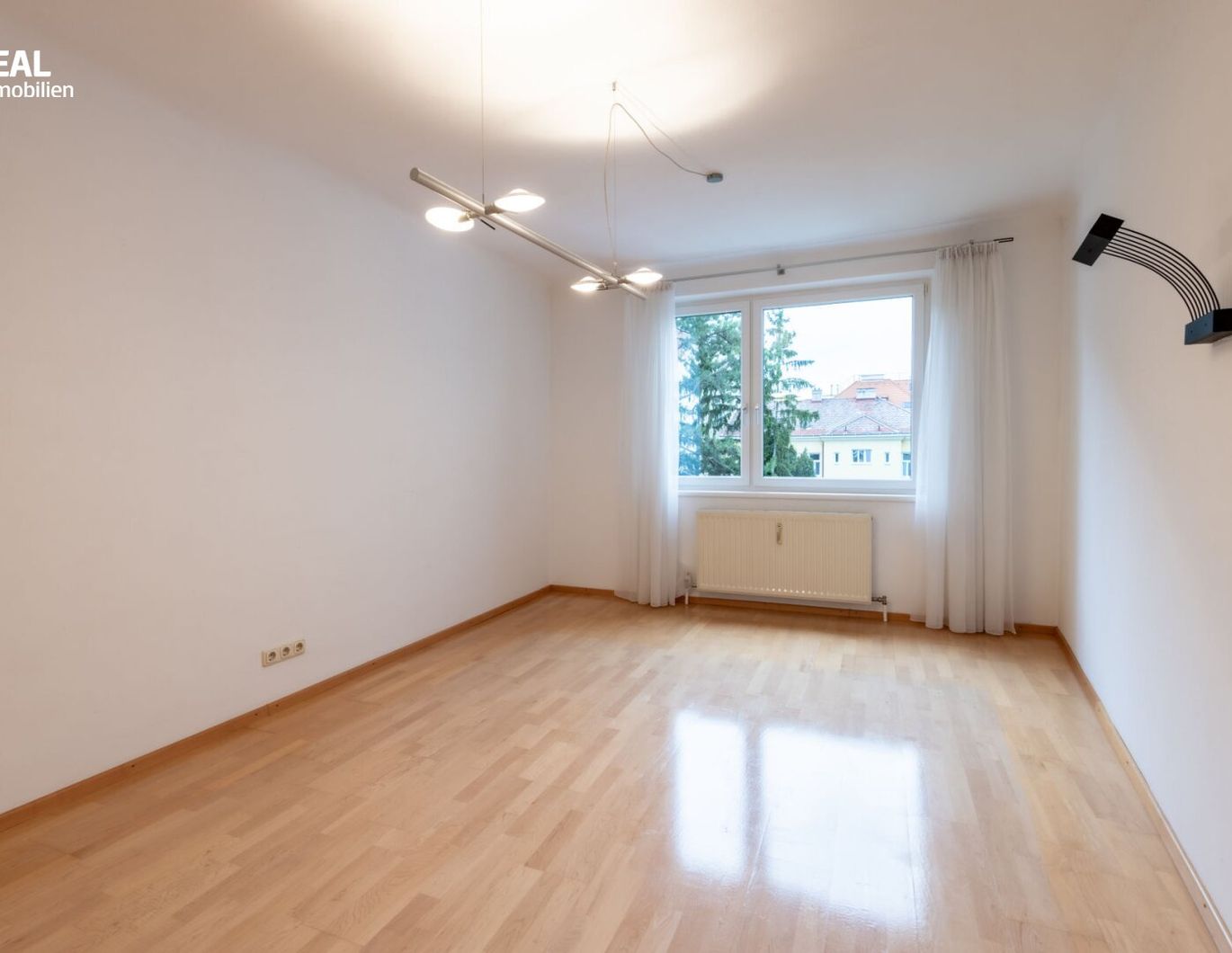 Charmante Wohnung mit Grünblick und Gartenmitbenützung