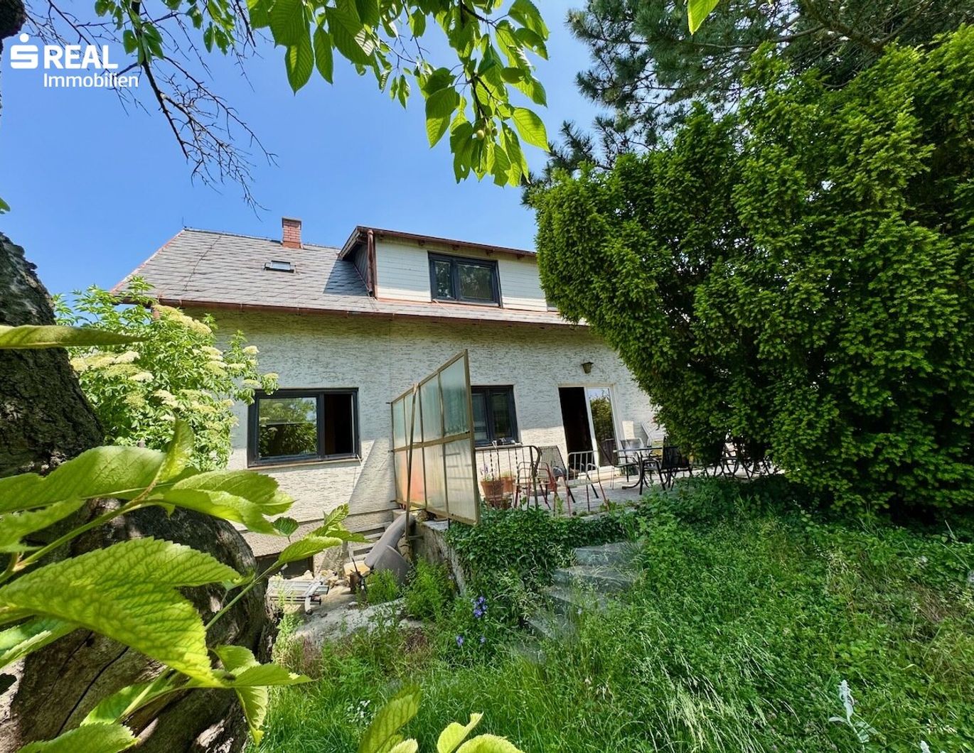 Einfamilienhaus mit herrlichen Altbaumbestand