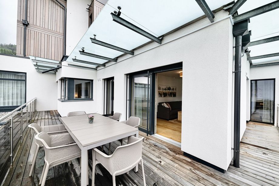 Bestlage Pinzgau mit ca. 6% Rendite! Sieben Apartments mit Terrassen, Balkonen und beheiztem Aussenpool