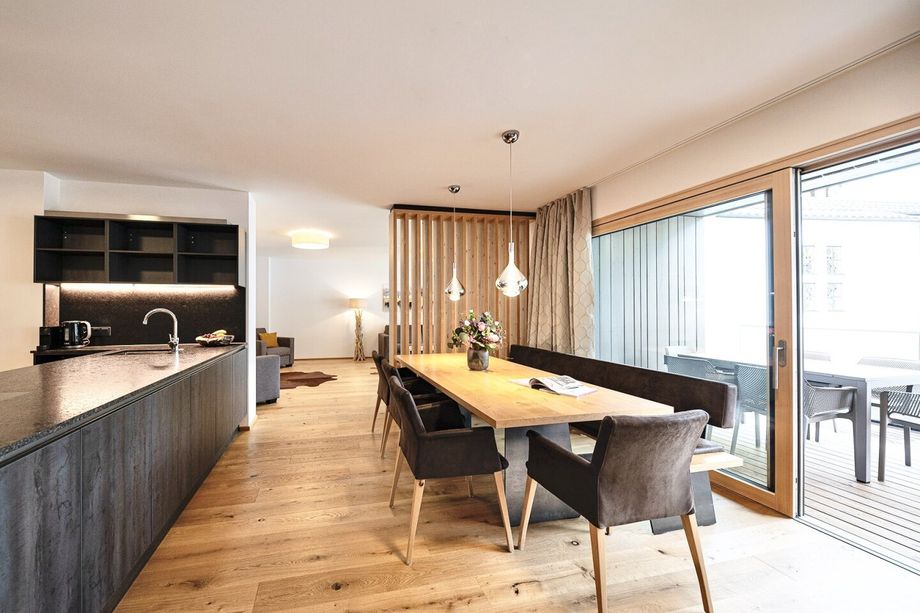 Bestlage Pinzgau mit ca. 6% Rendite! Sieben Apartments mit Terrassen, Balkonen und beheiztem Aussenpool
