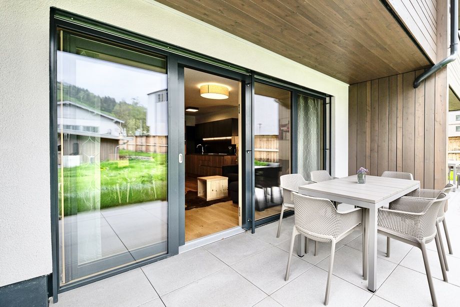 Bestlage Pinzgau mit ca. 6% Rendite! Sieben Apartments mit Terrassen, Balkonen und beheiztem Aussenpool