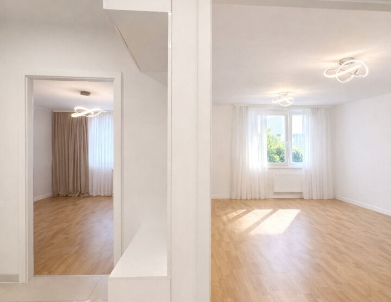 Stilvolle 3-Zimmer-Neubauwohnung in absoluter Ruhelage mit Innenhof-Garten & optionalem Parkplatz