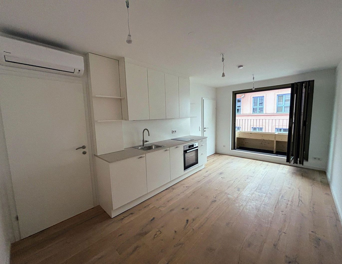 Erstbezug: Helle 2-Zimmer-Wohnung mit Balkon, moderner Ausstattung, Fußbodenheizung & Klimaanlage